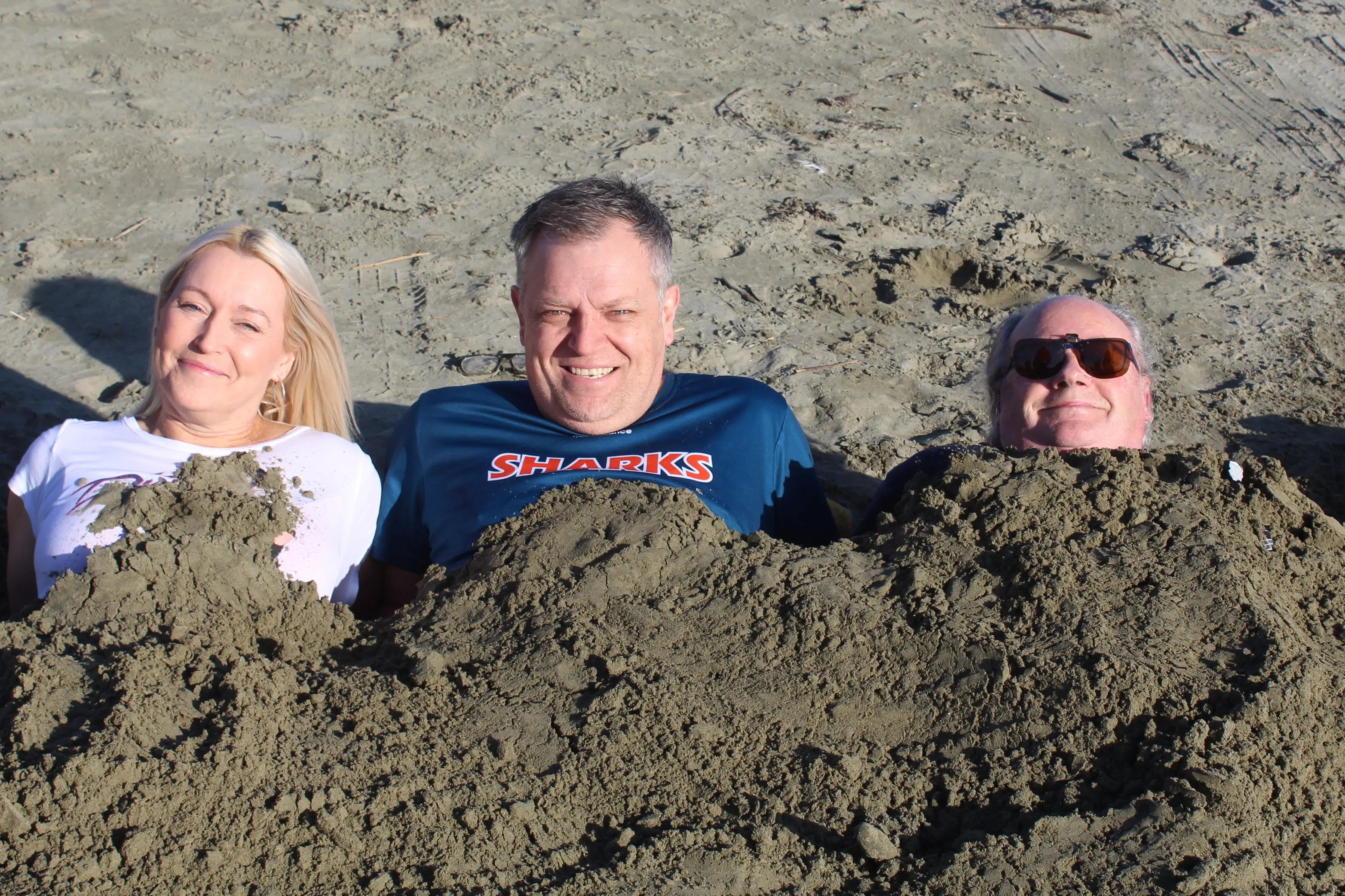 ILT marketing and innovation executive Angee Shand, More FM radio presenter Nick Jeffrey, and Invercargill Mayor Tom Campbell at Oreti Beach. Photo: Tayler Mutton