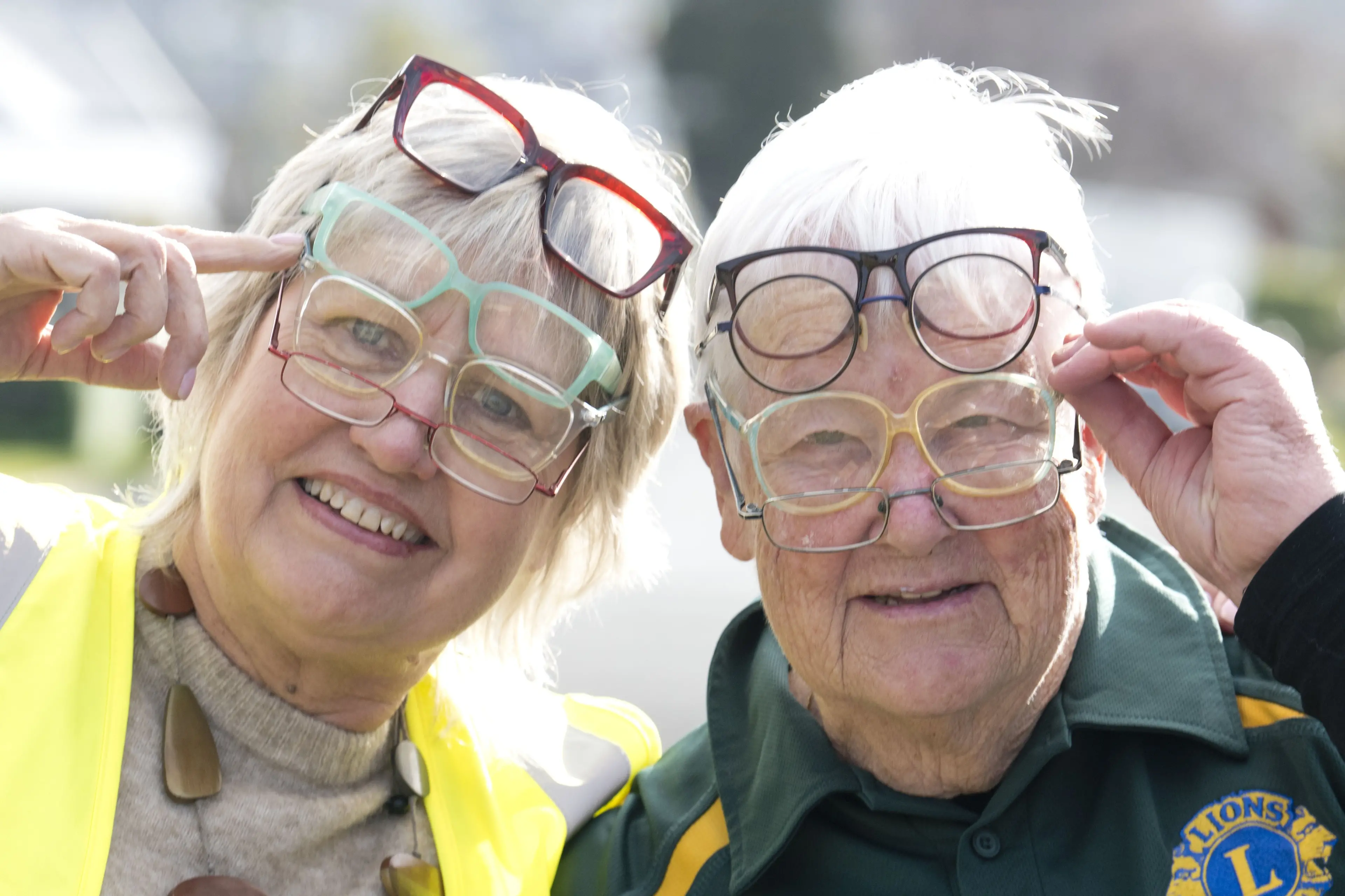 Lions Club members Ella Butson, left, and Anne Stratford with glasses collected to be sent to the Pacific Islands. Photo: Gerard O\\'Brien