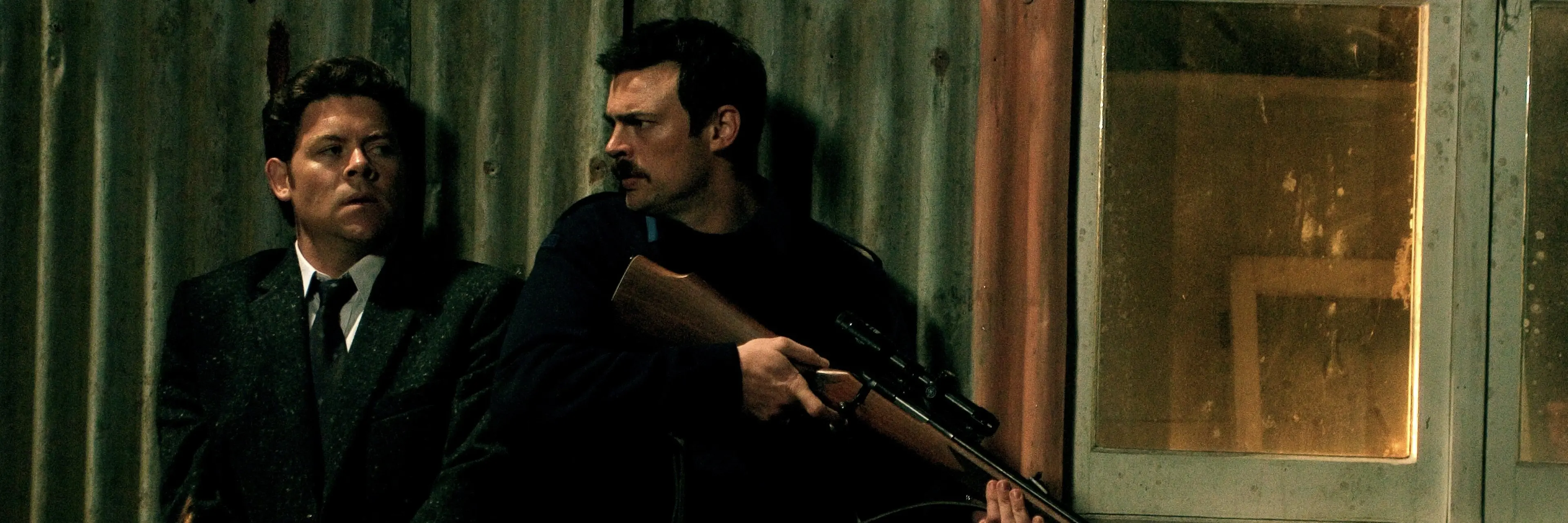 Actors Paul Glover (left), as Detective Paul Knox, and Karl Urban, as Constable Nick Harvey, in \\'Out of the Blue\\'.