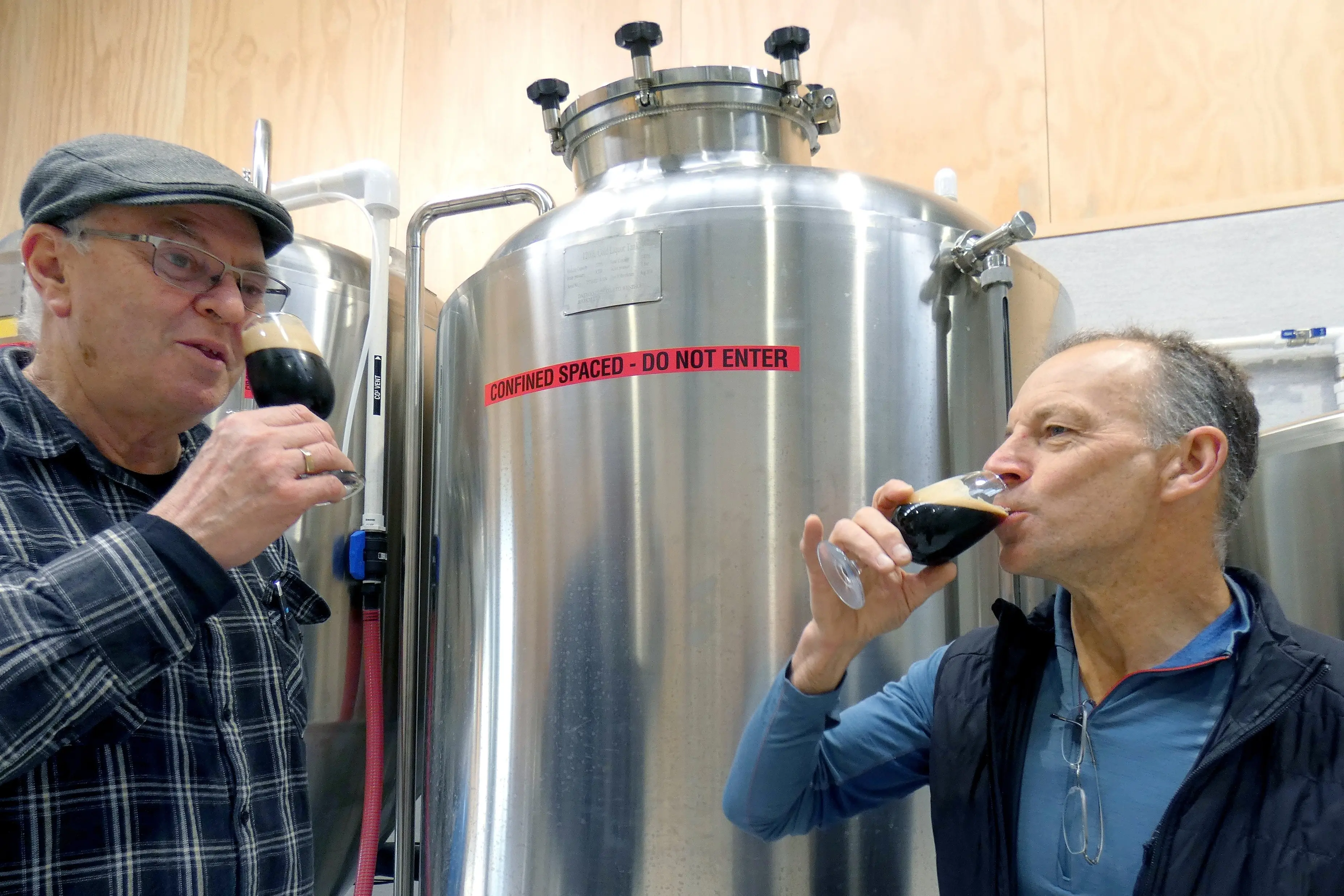Back when Otago Polytechnic\\'s Central Campus brewery was a going concern in 2019 operations manager Ben Middlemiss (left) and lecturer Geoff Collie tried the latest batch of porter at the school. Photo: ODT Files