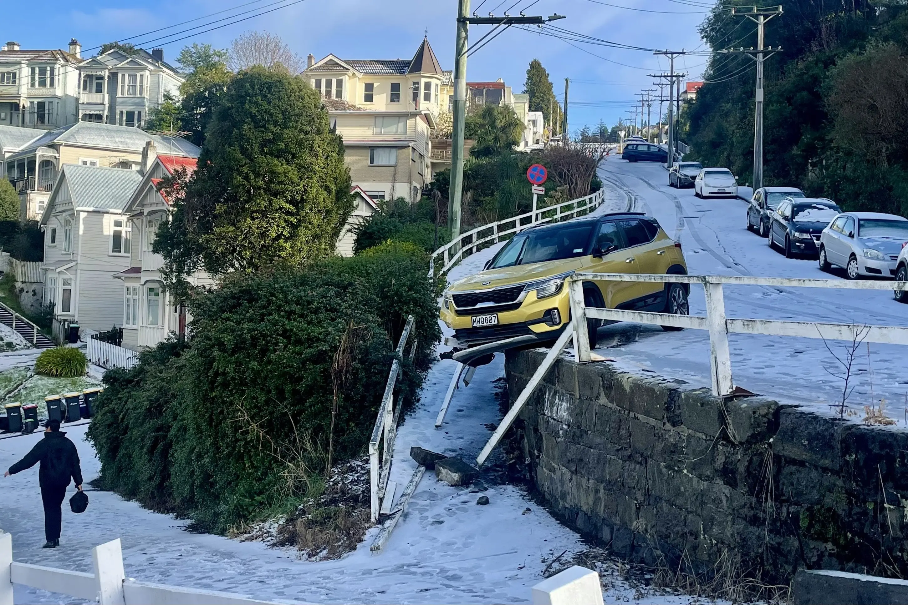 Neighbours took it upon themselves to repurpose road cones and closed the top of Canongate after this mishap on Tuesday morning during the snow in Dunedin. Photo: Christine O\\' Connor