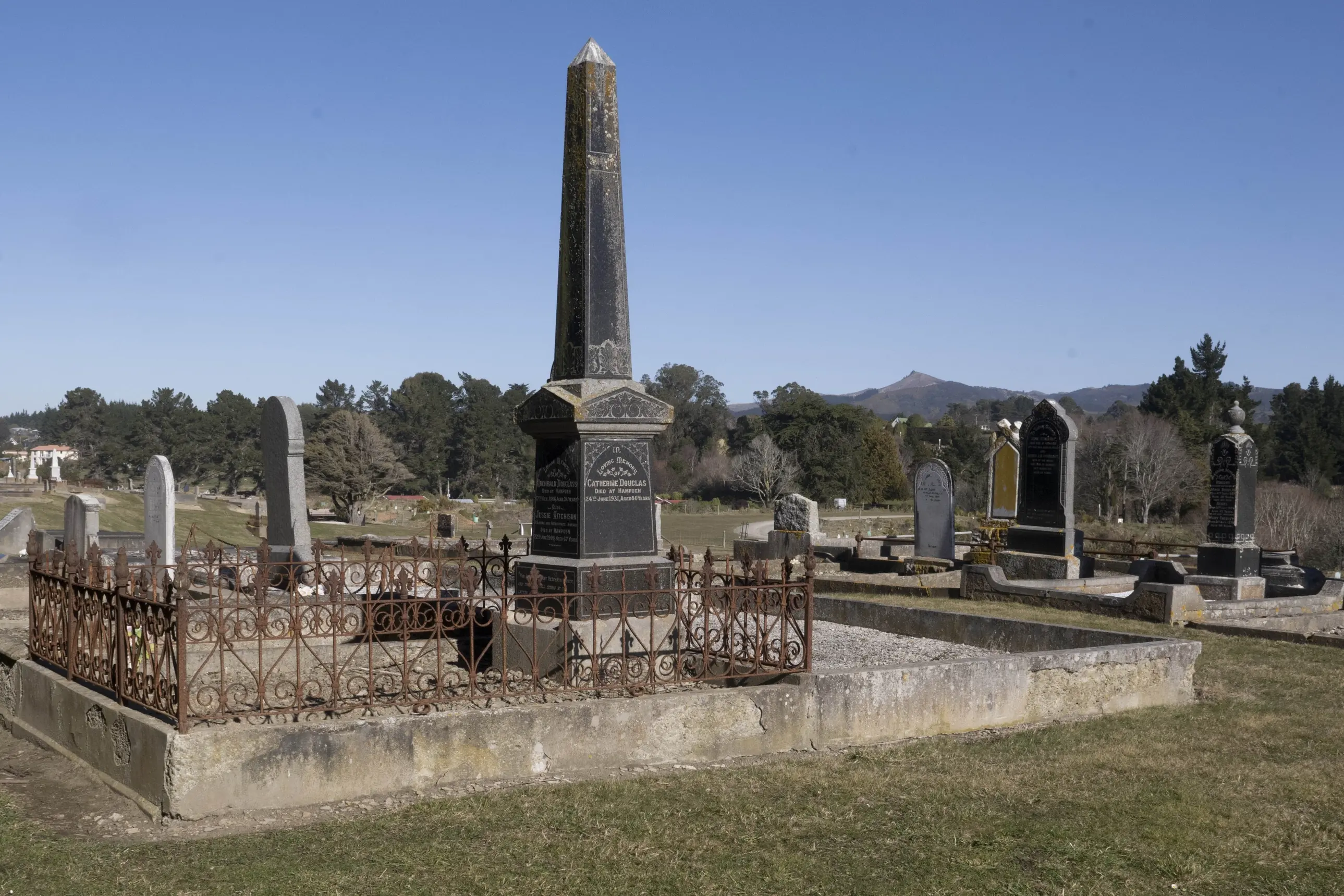 These graves in Hampden Cemetery sit closest to the coastal erosion threatening the site. Photo: Gerard O\\'Brien