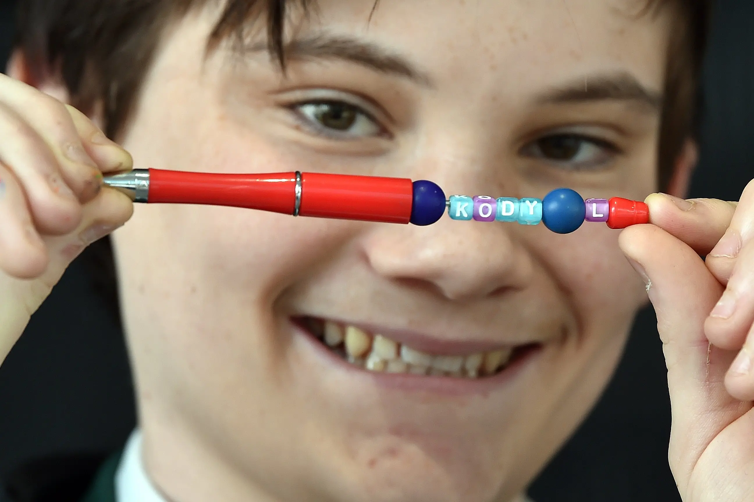 East Otago High School year 11 student Kody Lozell with one of the pens he is selling as part of the Young Entrepreneurs Scheme. Photo: Peter McIntosh