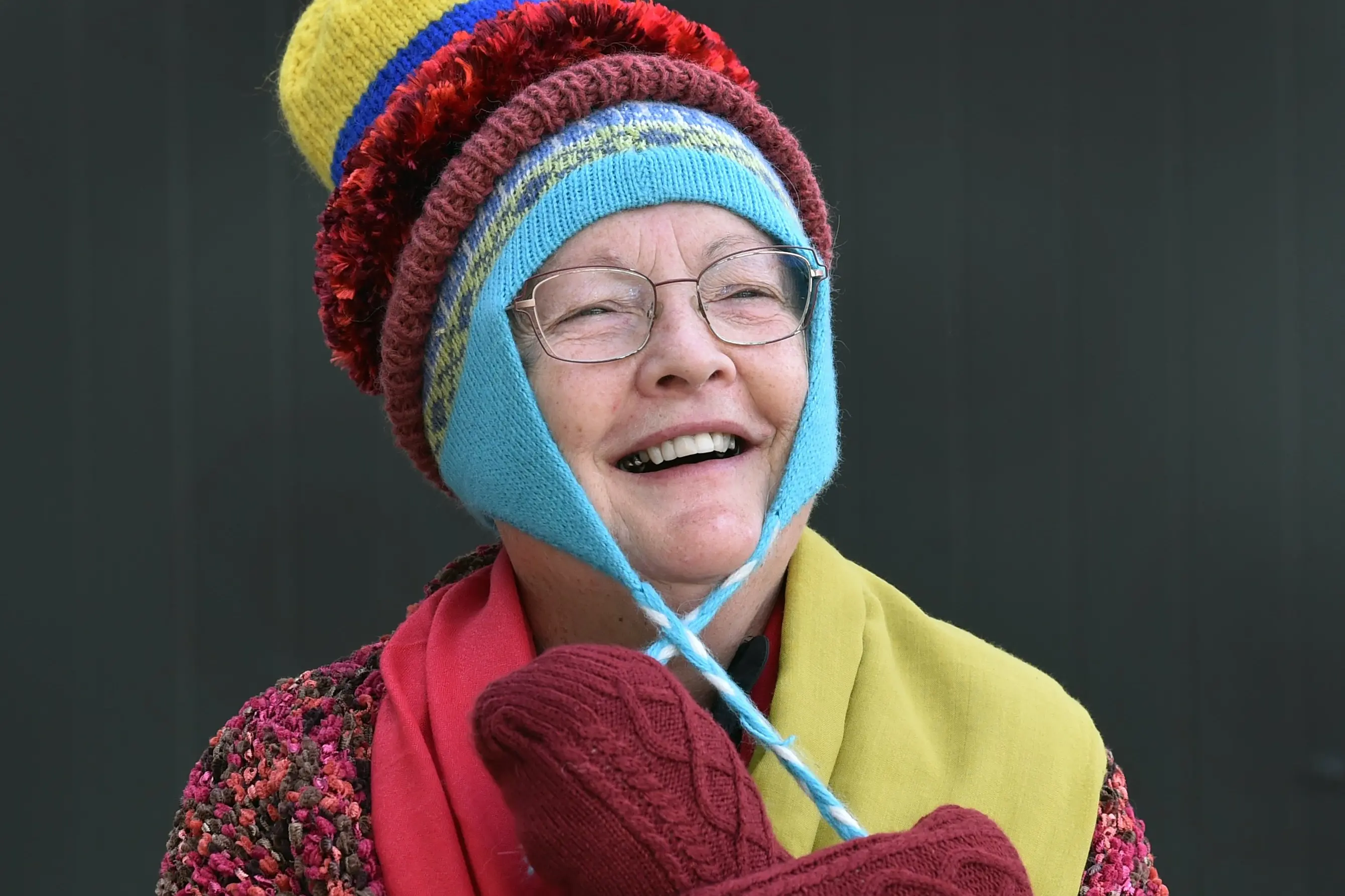 Caversham Coastal Unity Parish parishioner Barbara Turnbull rugs up during the parish\\'s Winter Warmer Sale on Saturday. Photo: Peter McIntosh