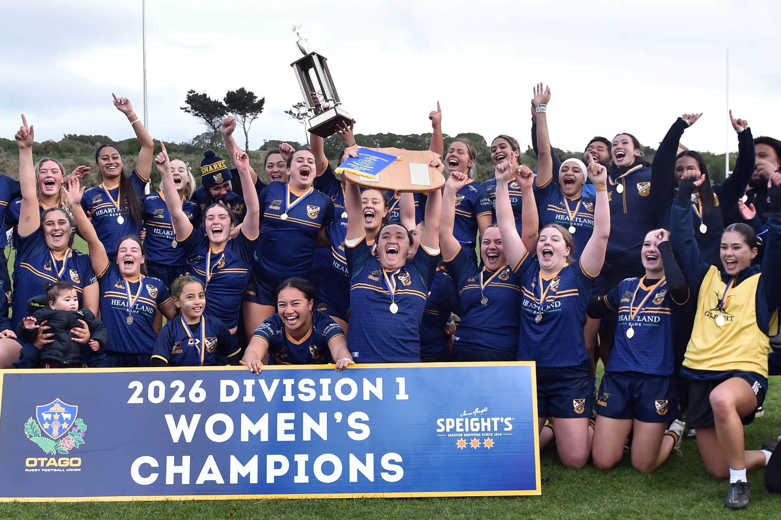 Dunedin players celebrate victory in the Otago metro division 1 women\\'s club rugby final at Tahuna Park on Saturday. Photo: Peter McIntosh