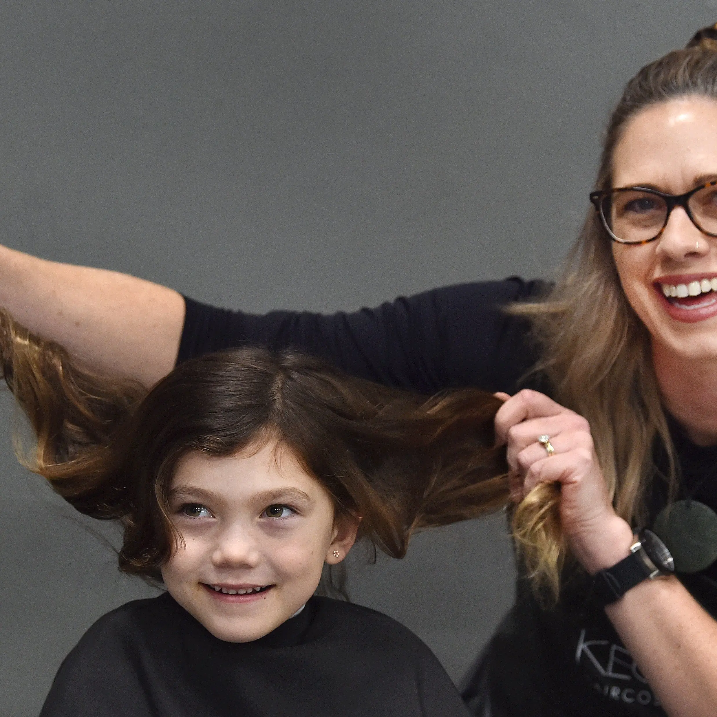 ‘Such a beautiful day’: Free haircuts a help for hundreds