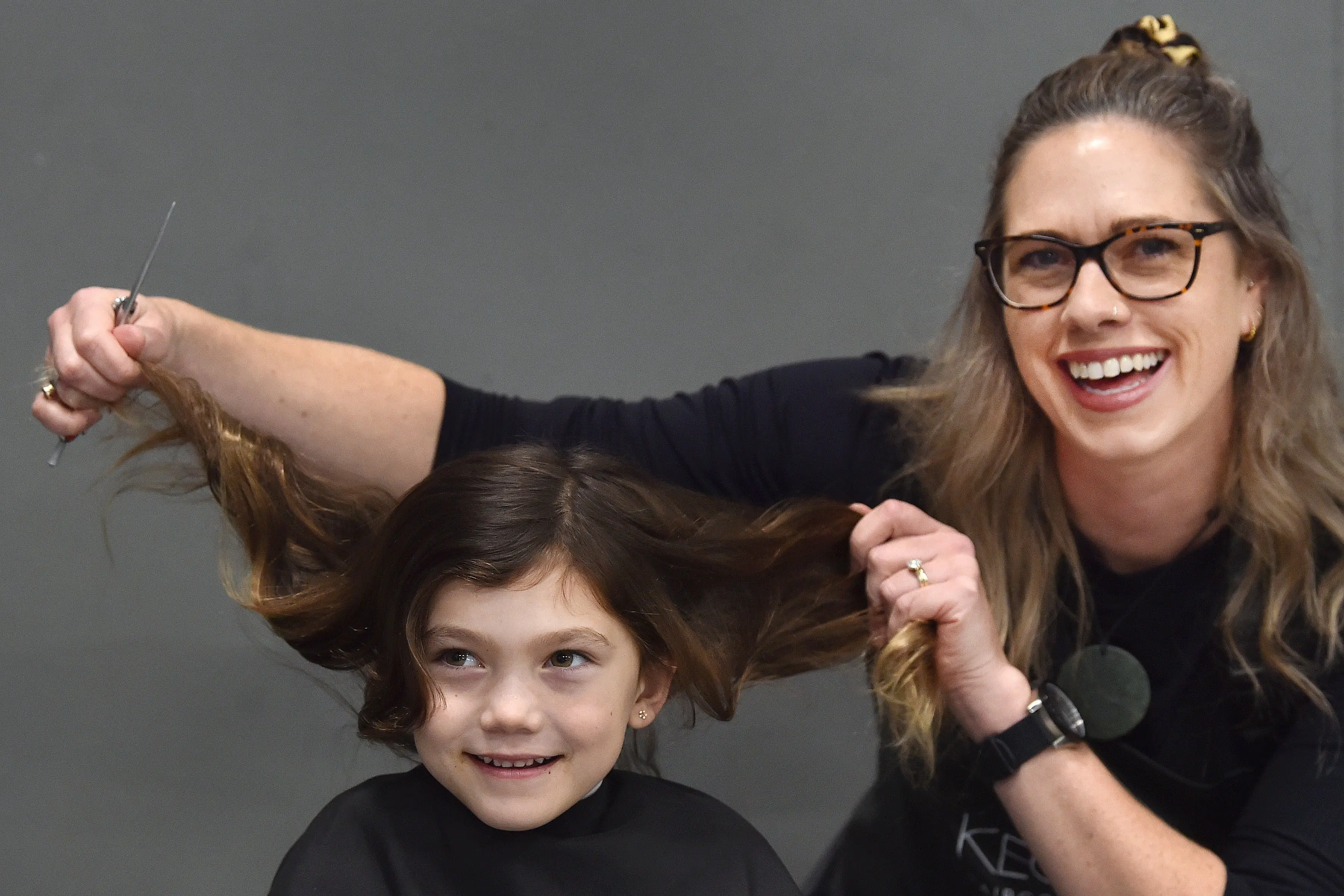 ‘Such a beautiful day’: Free haircuts a help for hundreds