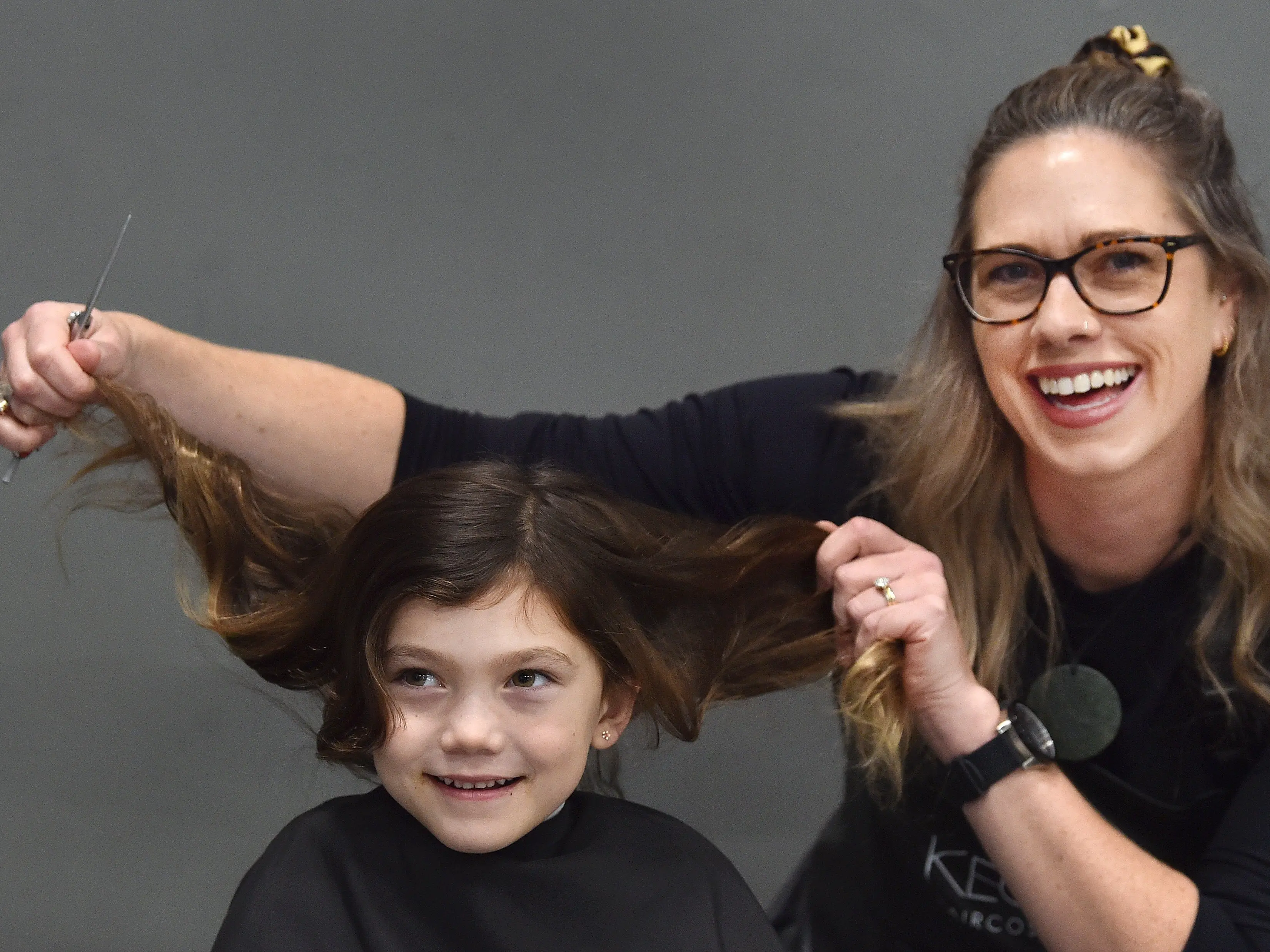 ‘Such a beautiful day’: Free haircuts a help for hundreds