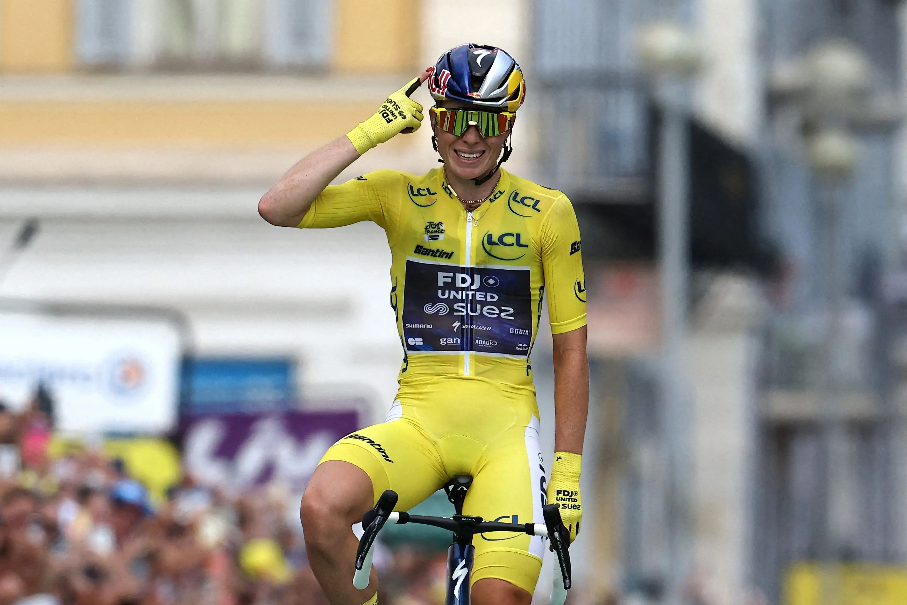 Demi Vollering celebrates after winning stage nine and the Tour de France Femmes. Photo: Reuters