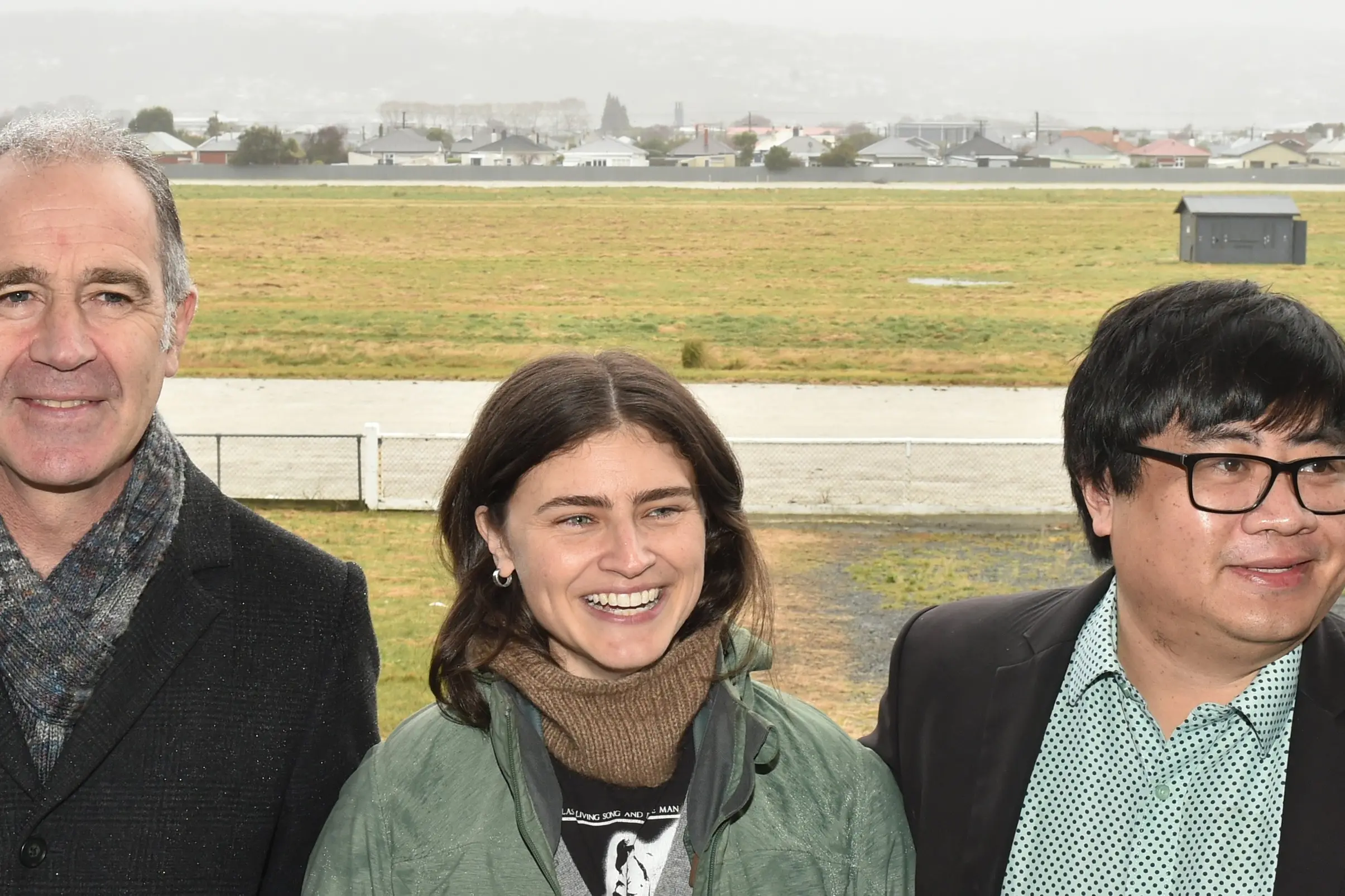 Green MPs Scott Willis, Chl\\u00F6e Swarbrick and Francisco Hernandez with South Dunedin in the background. Photo: Gregor Richardson