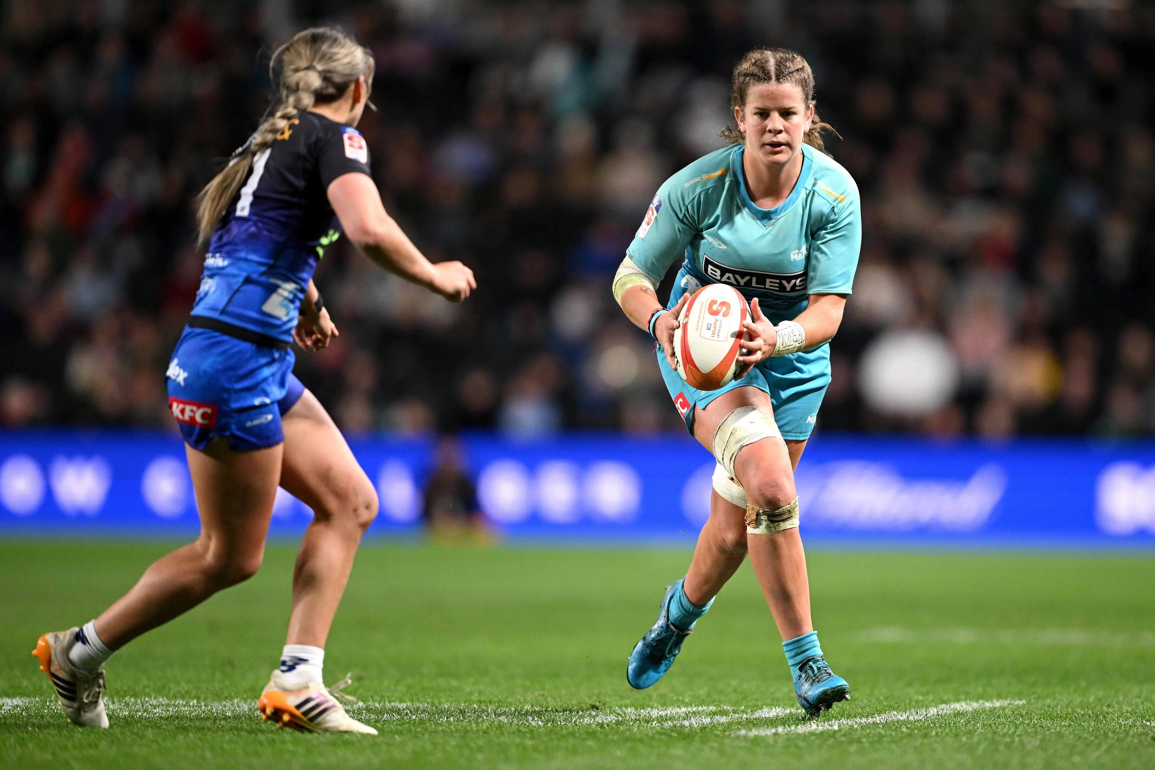 Matat  loose forward Sarah Jones looks to evade Jaymie Kolose during the Super Rugby Aupiki final. Photo: Getty Images