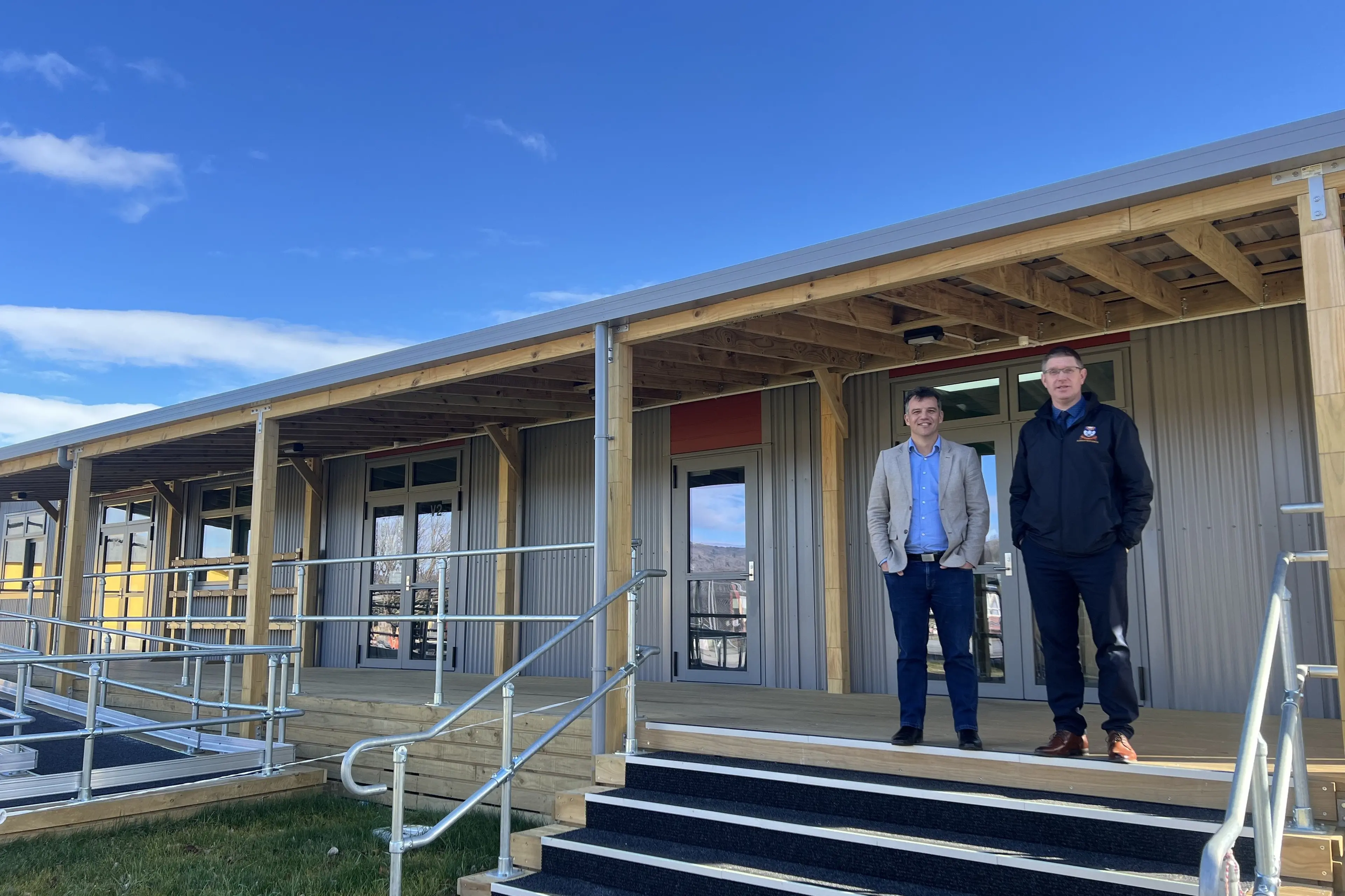 Southland MP Joseph Mooney (left) and Dunstan High School principal Andrew King outside one of the six new classrooms added as a part of the school\\'s latest development. Photo: Carys Trotter