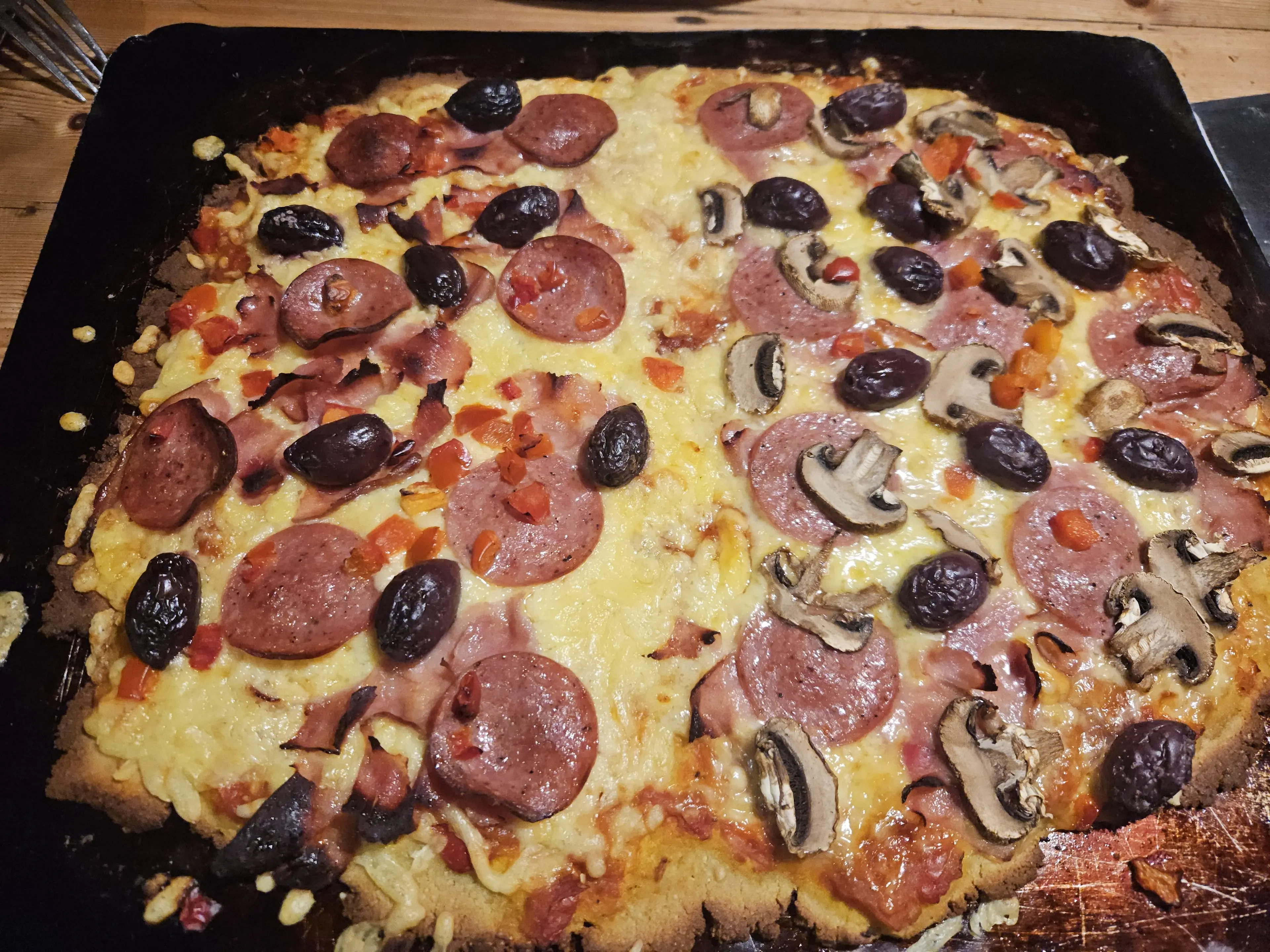 Lupin-base pizza. Most lupin seeds are toxic, but this pizza base was made with seeds from <i>Lupinus mutabilis</i>, a variety stocked by the Koanga Institute. They\\'re edible, if you are prepared to do a lot of processing. The alternative is to by Australian lupin flour made from the cultivar <i>Lupinus angustifolius</i>, which is not to be confused with blue flowering lupins, which are inedible. Photo: Hilary Rowley