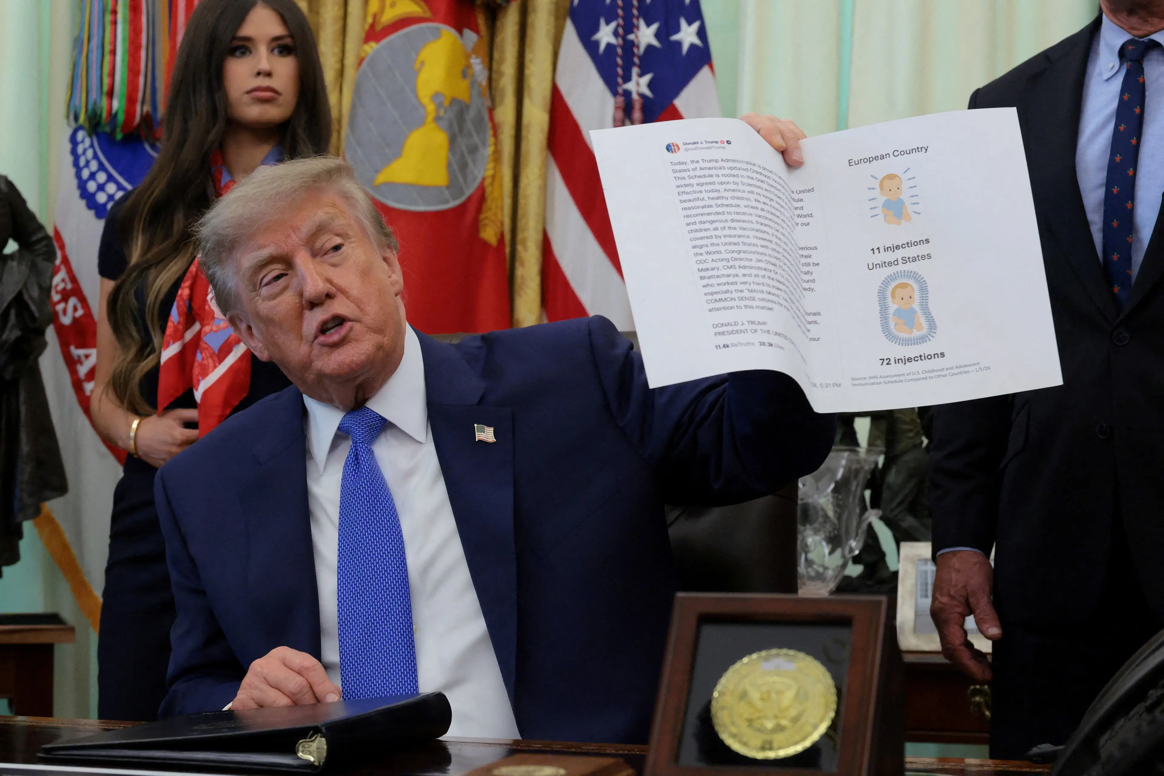 US President Donald Trump speaks during an event to sign an executive order regarding vaccine flexibility, in the Oval Office at the White House in Washington. Photo: Reuters