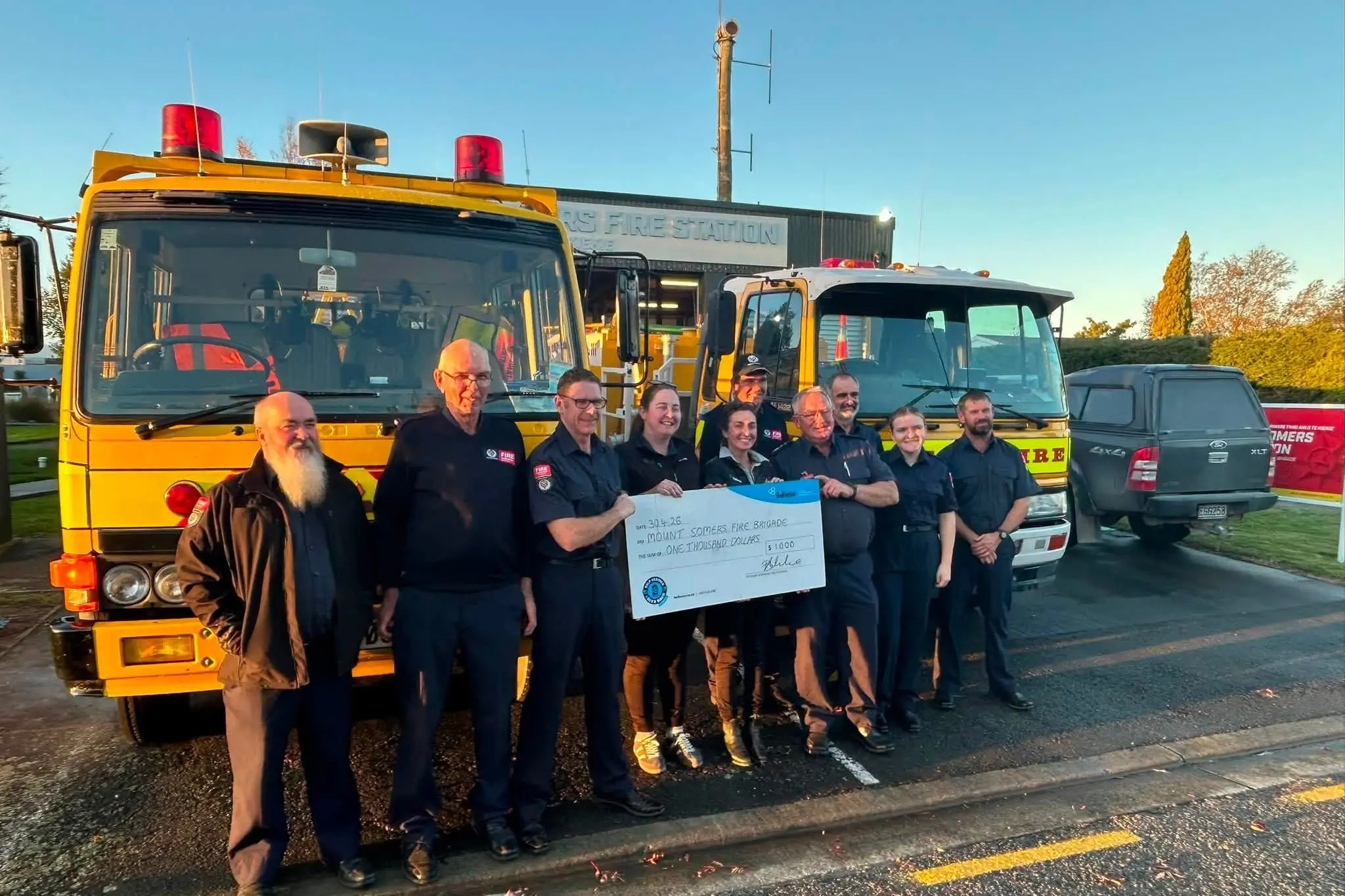 Ballance Agri Nutrients staff Geraldine Cook and Madeleine Horne presented a $1000 donation to the Mt Somers Volunteer Fire Brigade last month. Photo: Supplied