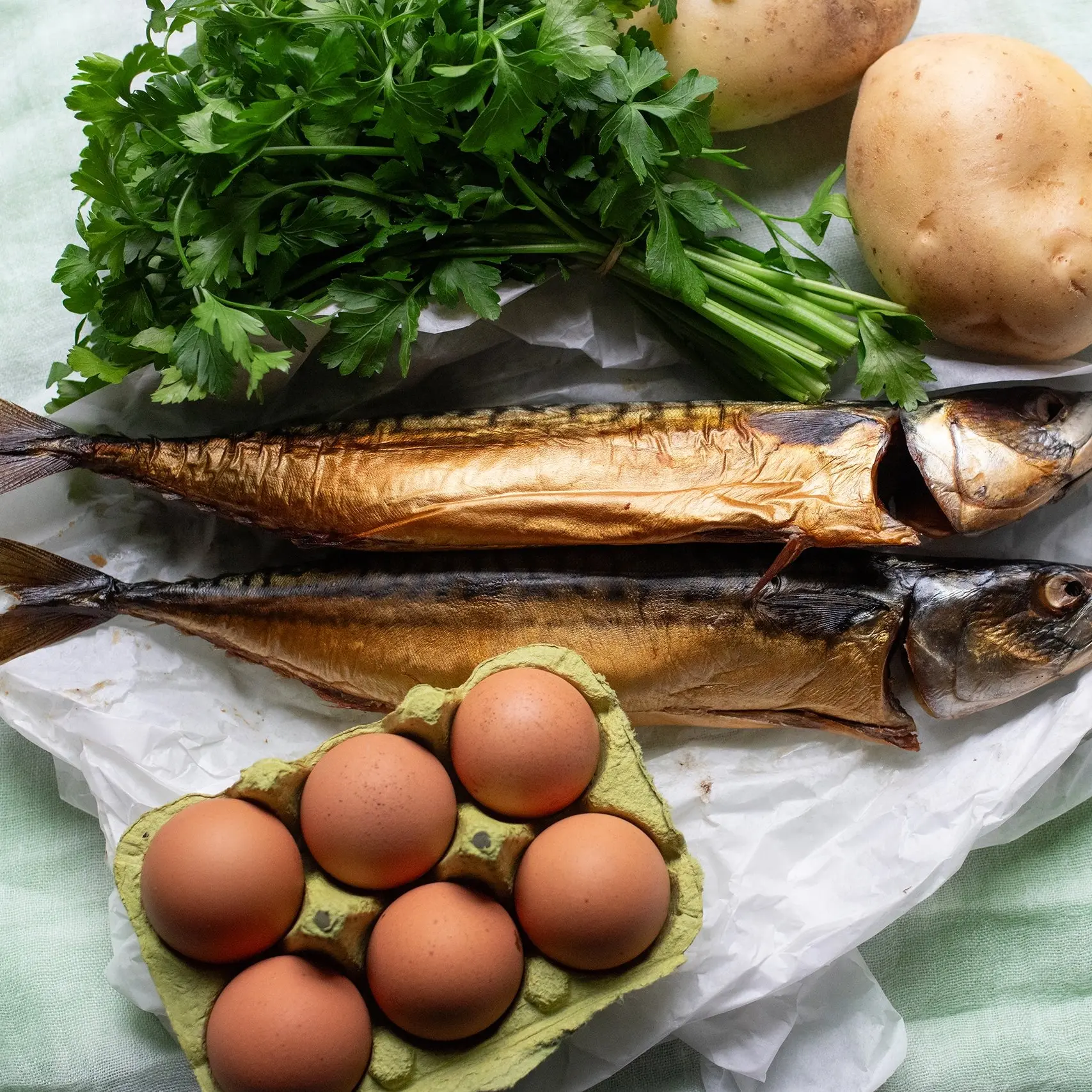 Potato cakes, smoked mackerel and parsley sauce