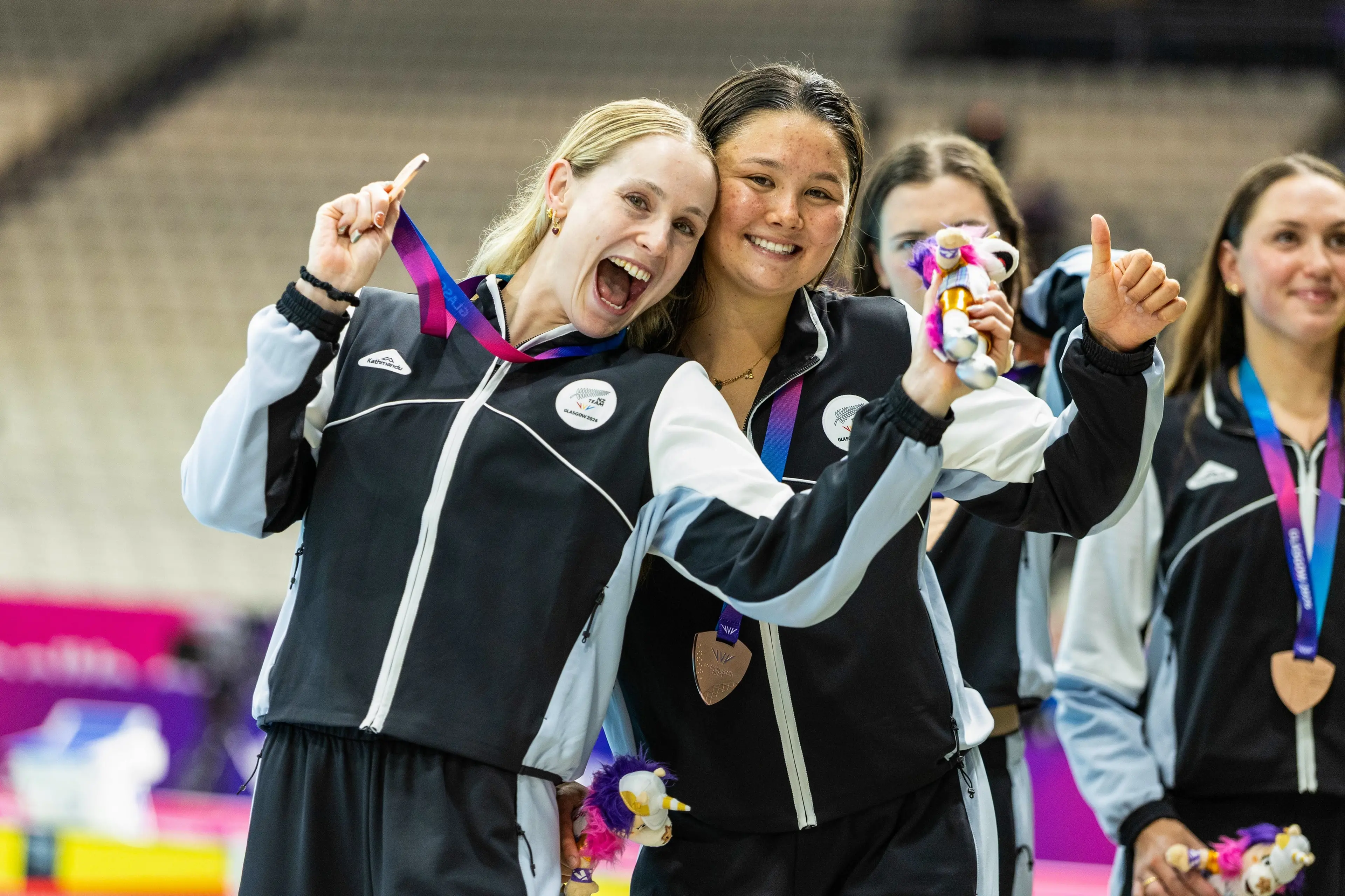 Dunedin swimmer Caitlin Deans (left) and New Zealand team-mate Milana Tapper celebrate winning bronze in the women\\'s 4x200m freestyle relay at the Commonwealth Games. Photo: Getty Images