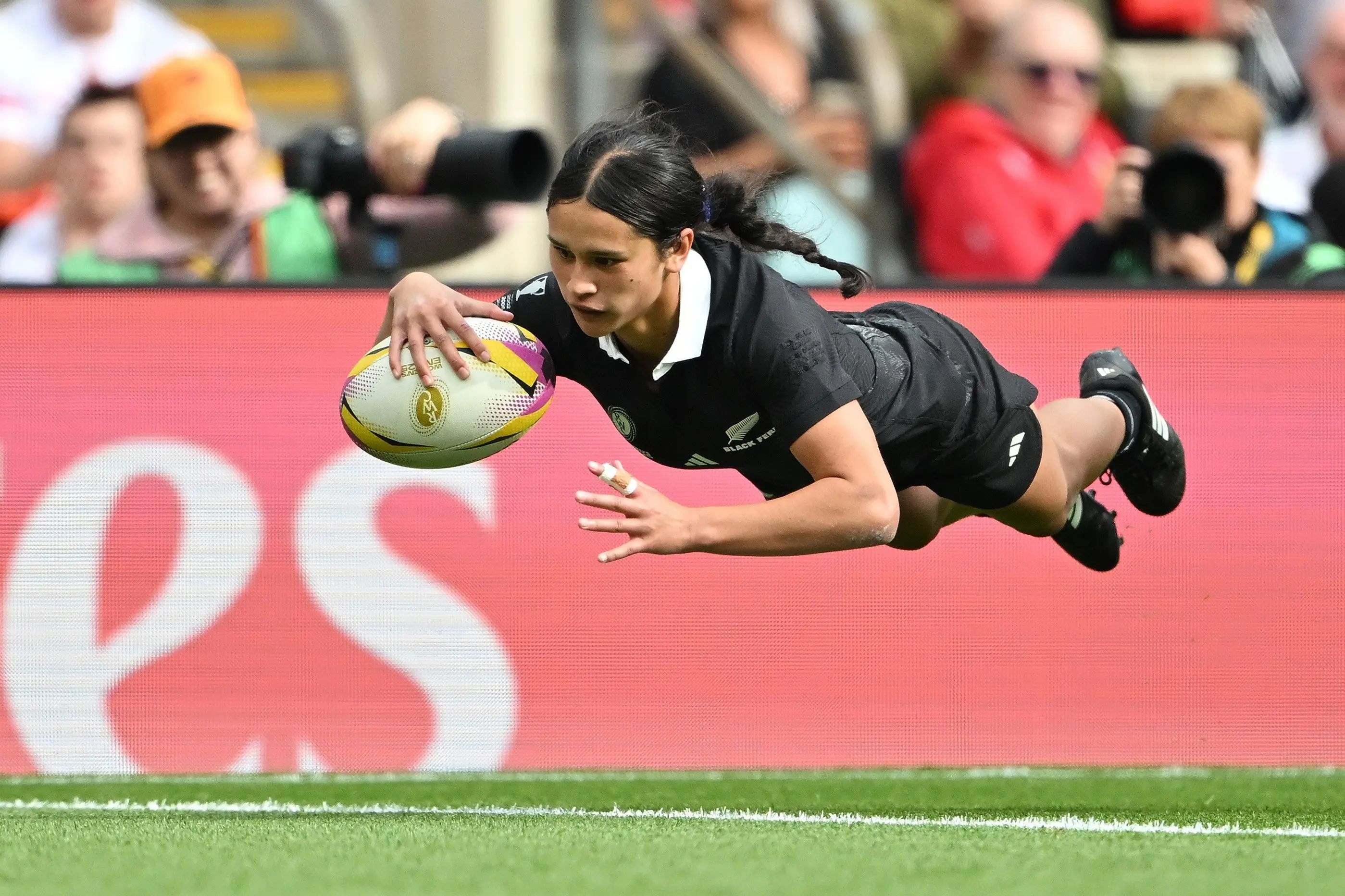 Black Fern Braxton Sorensen-McGee scores during the bronze medal game at the Rugby World Cup in England last year. Coverage of the World Cup rose to 42%, which was 4% higher than the World Cup in New Zealand in 2022. Photo: Getty Images