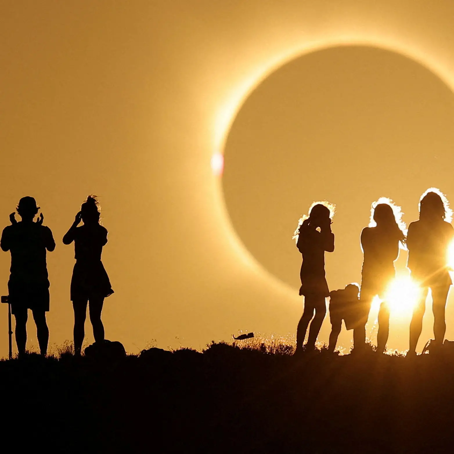 ‘Like science fiction’: Total solar eclipse wows spectators in Spain