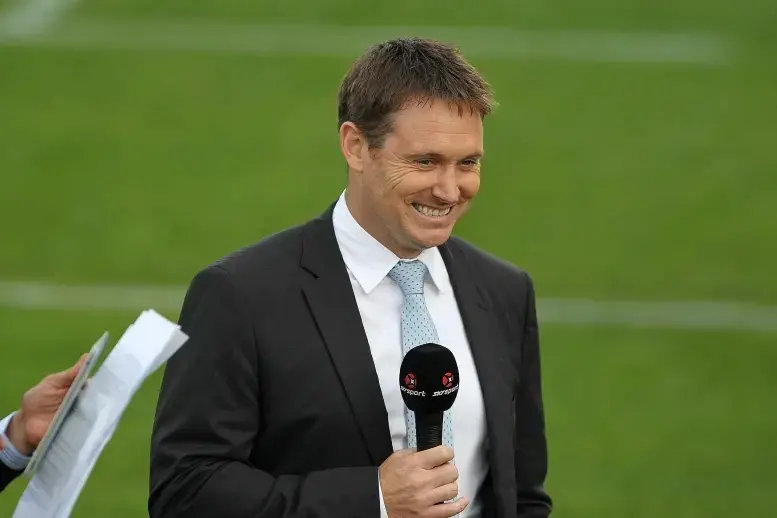 Andrew Mehrtens working as a rugby commentator following his playing career. Photo: Getty Images