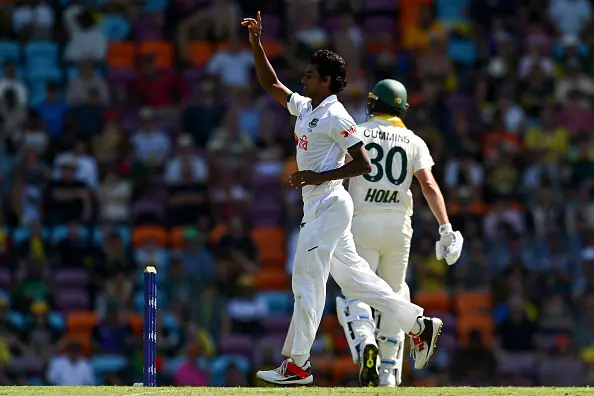 Hasan Mahmud celebrates dismissing Australia\\'s skipper Pat Cummins during day one of the first test in Darwin. Photo: CA/Cricket Australia via Getty Images