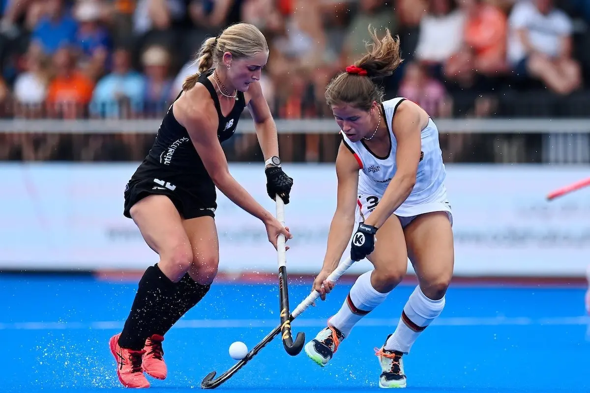 Black Stick Katie Doar (left), controls the ball against Germany\\'s Linnea Weidemann, is excited to be back with the Black Sticks for the Hockey World Cup. Photo: Frank Uijlenbroek