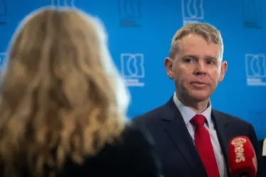 Labour leader Chris Hipkins speaks to media at the conference. Photo: RNZ