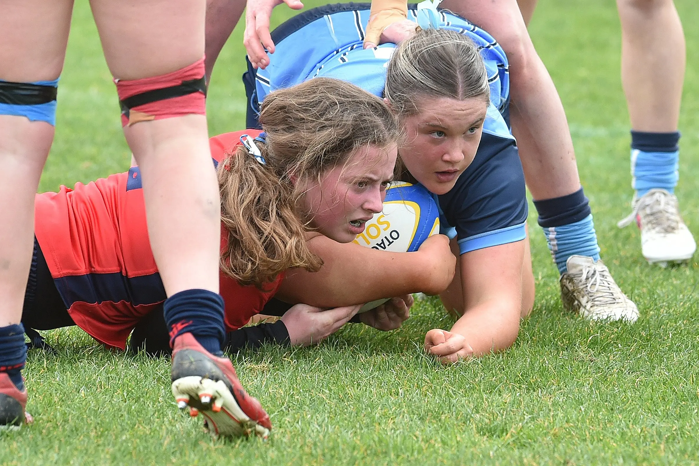 St Hilda\\'s Collegiate prop Liv O\\'Brien (right) scores her side\\'s opening try under pressure from Southland Girls\\' hooker Isla Robertson at Tahuna Park on Saturday. Photo: Gregor Richardson