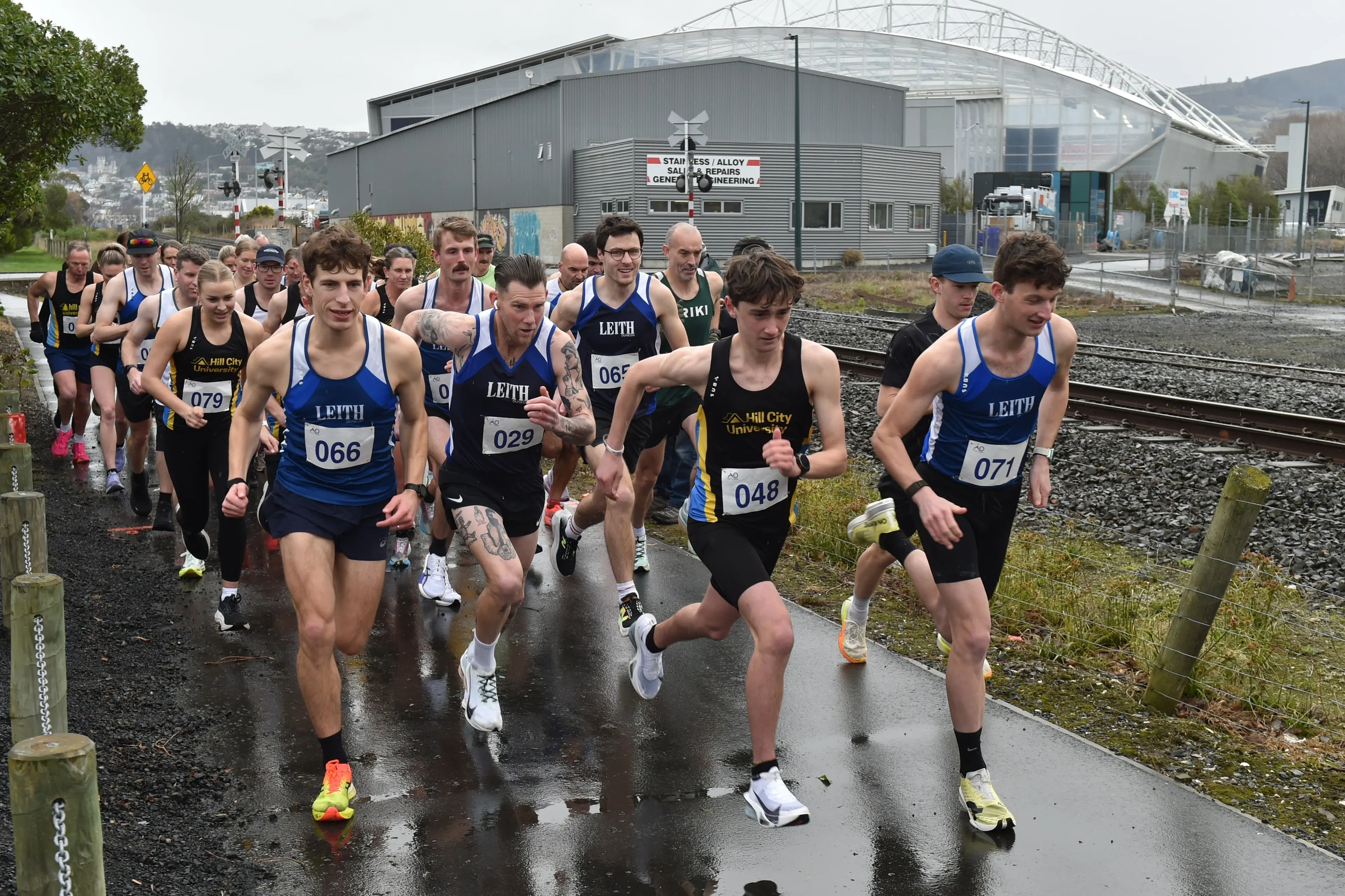 Runners jostle for position at the start of the senior race at the Otago road championships in Magnet St on Saturday. Photo: Gregor Richardson