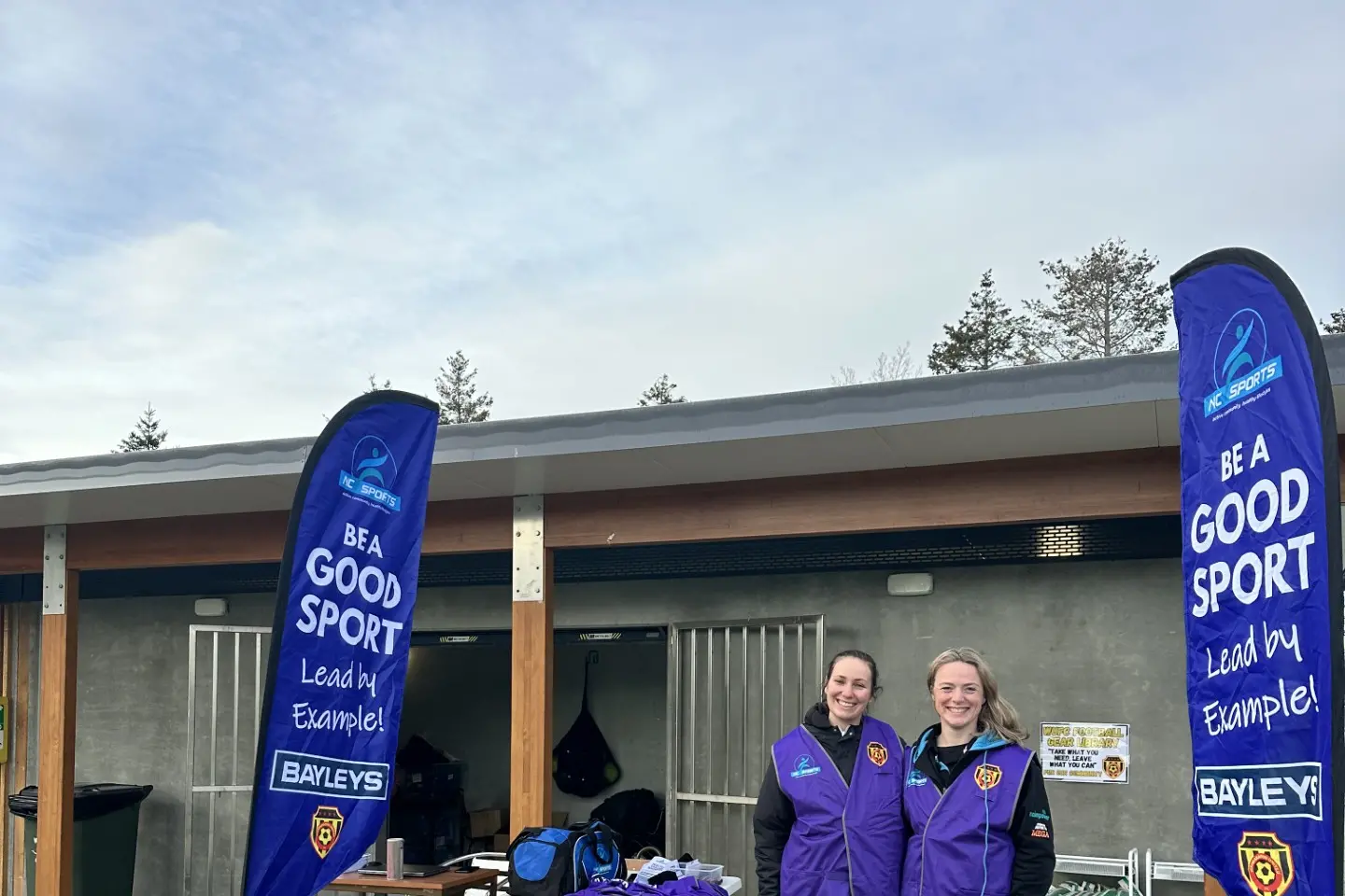 Good Sport . . . A positive sideline behaviour campaign spearheaded by NC Sports and supported By Bayleys North Canterbury is gaining momentum across the region. It is led by Abbey Jenkins-McCaw (right), Positive Sports Advisor, NC Sports. She was joined by Tahlia Herman-Watt (left), Community Development Officer at Waimak United Football Club at recent EUFC matches in Rangiora. Photo Supplied