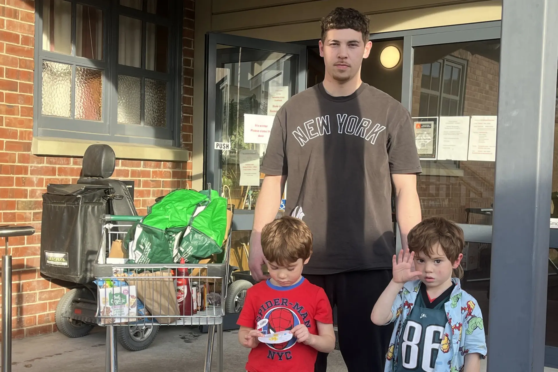As prices go up, the food bank at the Salvation Army has helped one young family find a bit of breathing room as Terry Taurima continues to support three kids on an income which seems smaller by the day. Pictured: Myciaah Fowler, 4, Terry Taurima, TJ Fowler, 4. Photo: Gerrit Doppenberg