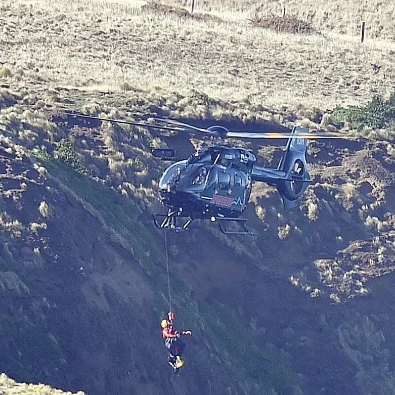 Helicopter rescue saves missing Dunedin surfer trapped on rock ledge