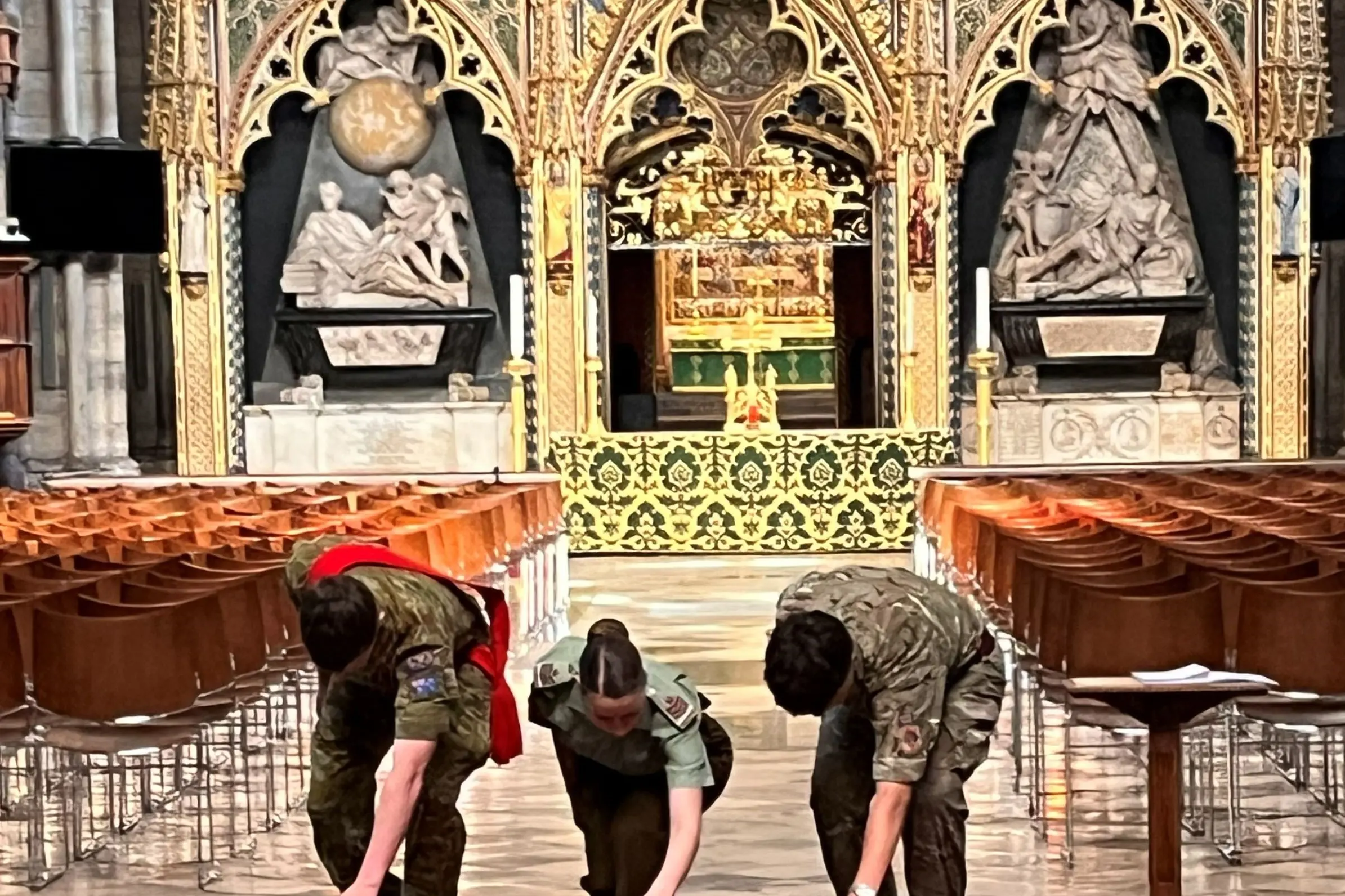 Ashburton Cadet Unit Sergeant Maddie Kennerley (centre) lays a wreath at Westminster Abbey in London as part of ANZUK Exercise.  Photo: Supplied