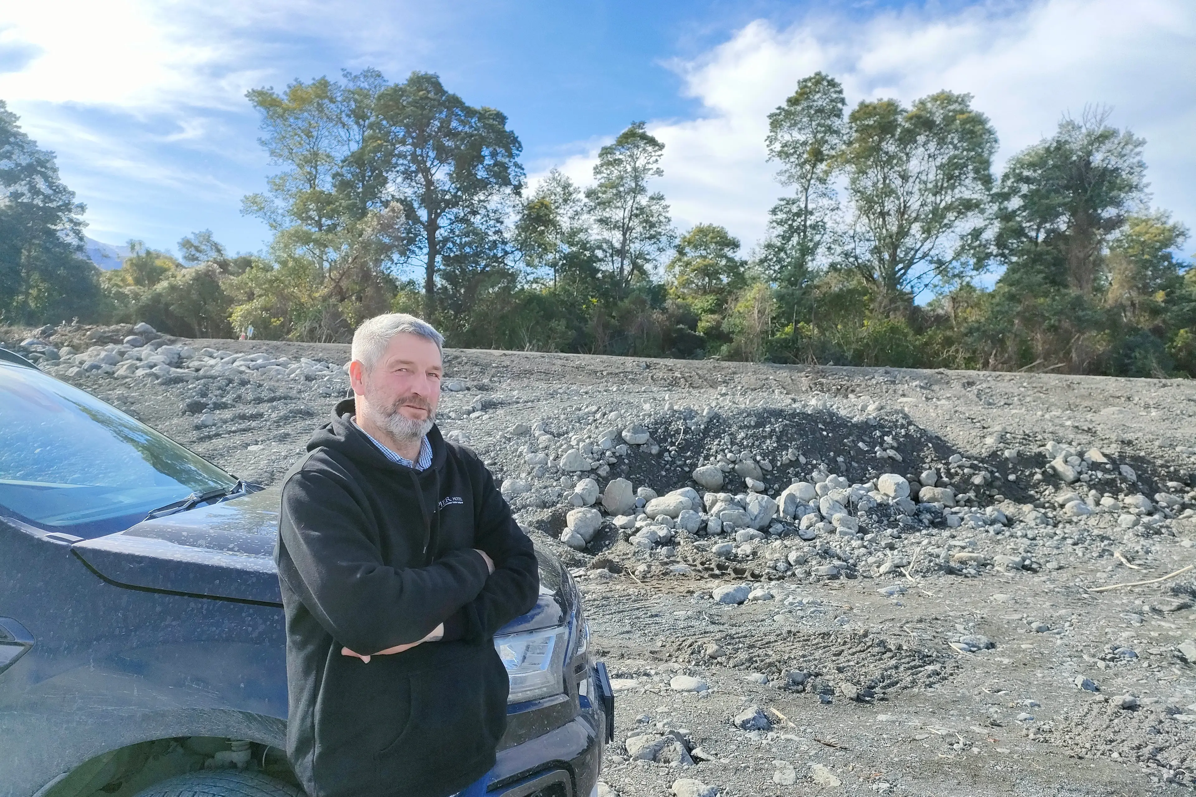 Mayoral inspection . . . Kaikoura Mayor Craig Mackle inspects the build of gravel on the Kowhai River, following last month\\u2019s flood. Photo: David Hill