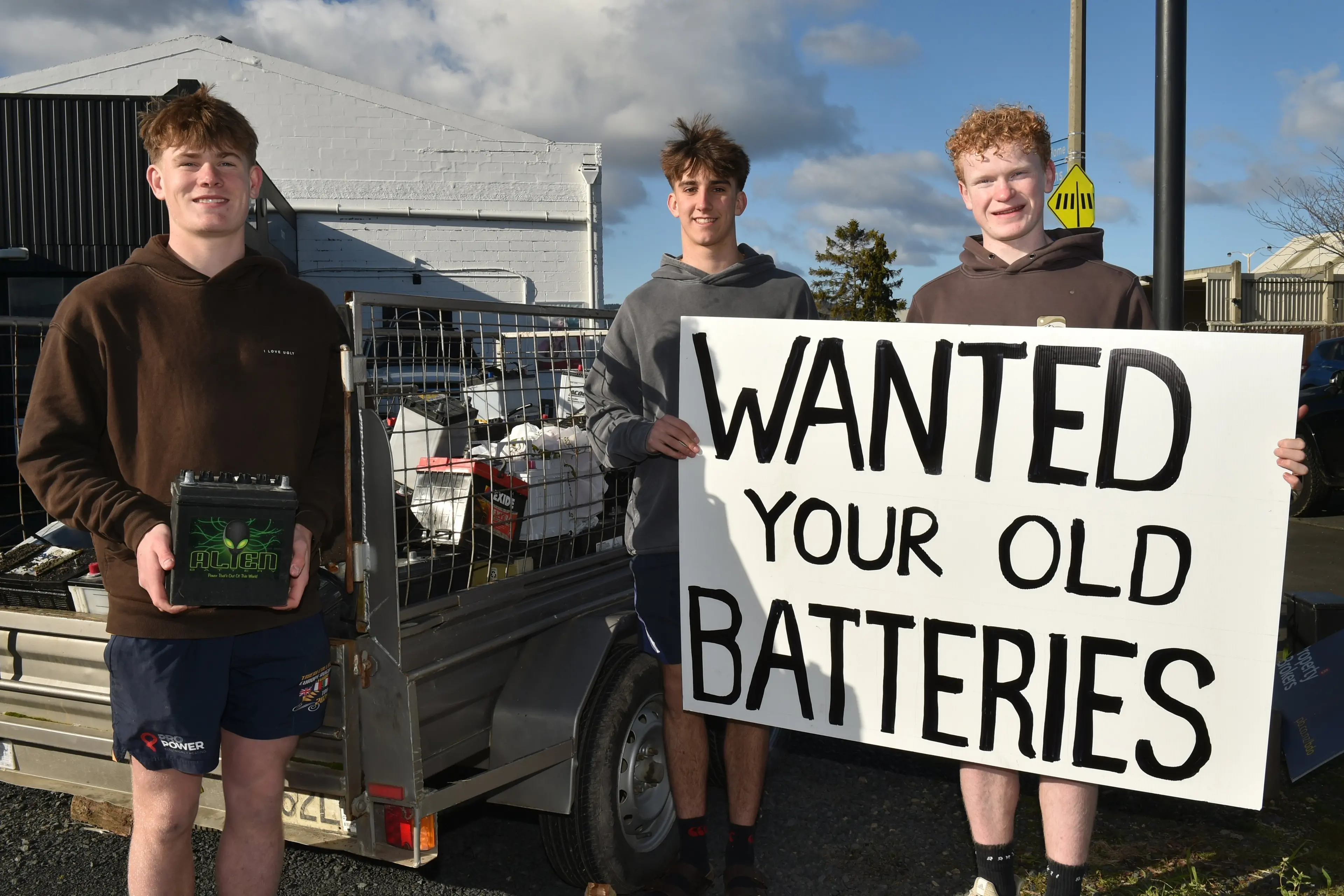 Involved in the Taieri College senior touch team fundraiser are (from left) Hudson Shaw, 17, Liam Lord, 16 and Oakley Bird, 17, who are collecting old car batteries to raise funds.  Photo: Gregor Richardson