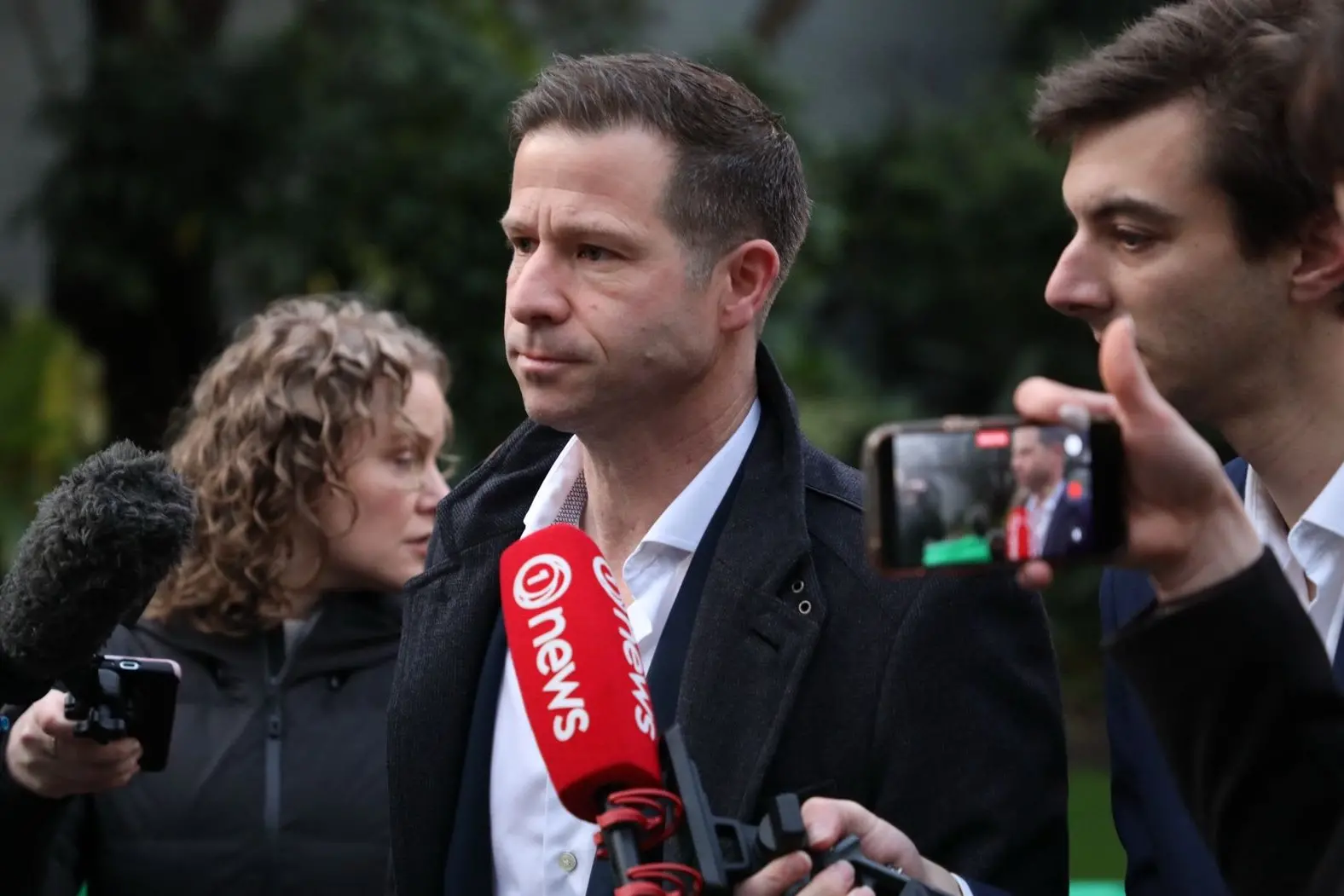 Chris Penk arrives at Parliament ahead of an urgent caucus meeting on August 12. Photo: RNZ