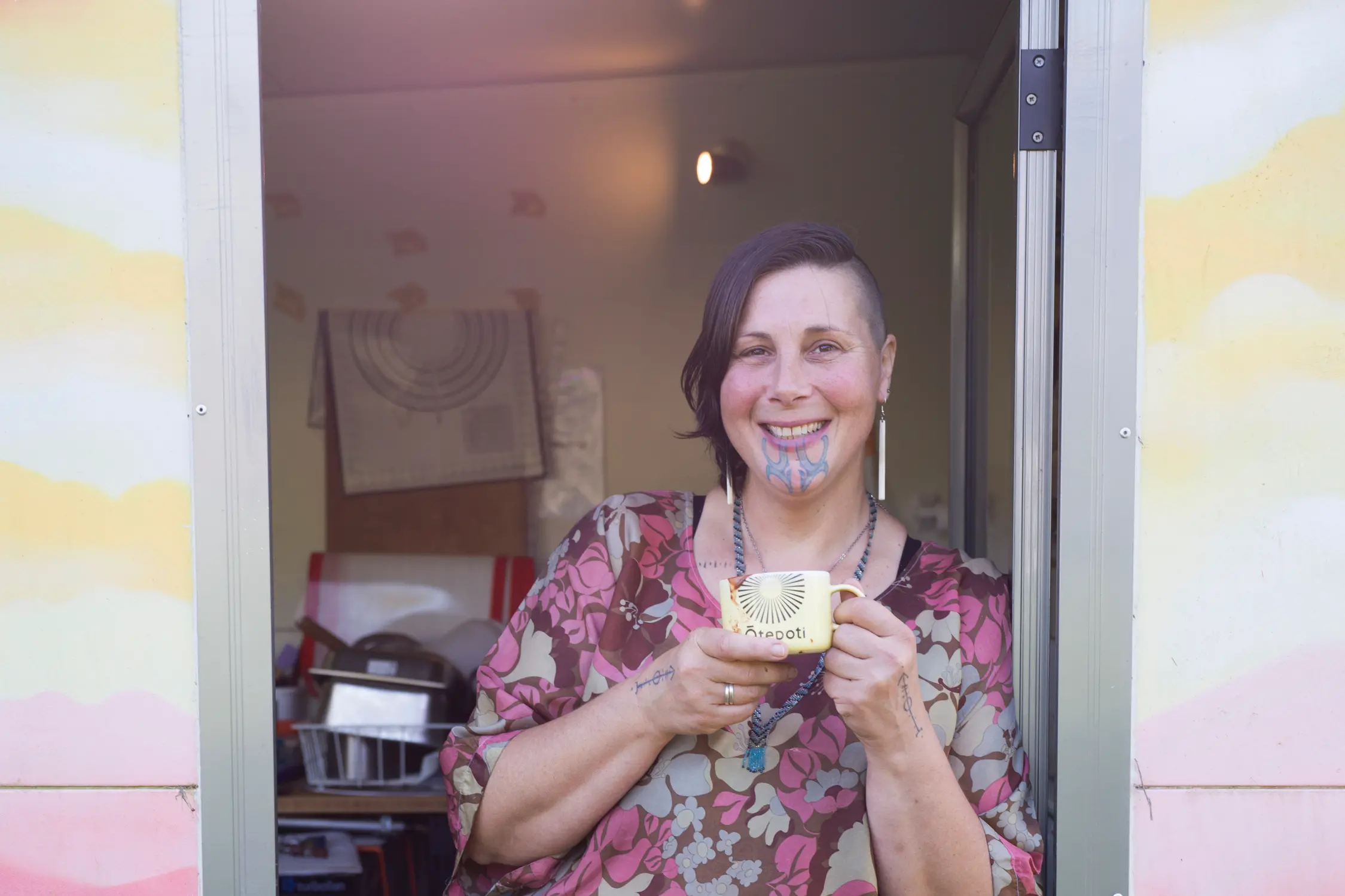 Ka k\\u0101 w\\u0101 founder Mar\\u014Dtini stands in the doorway of her kitchen in Waitati. Photo: Rachael McKenna