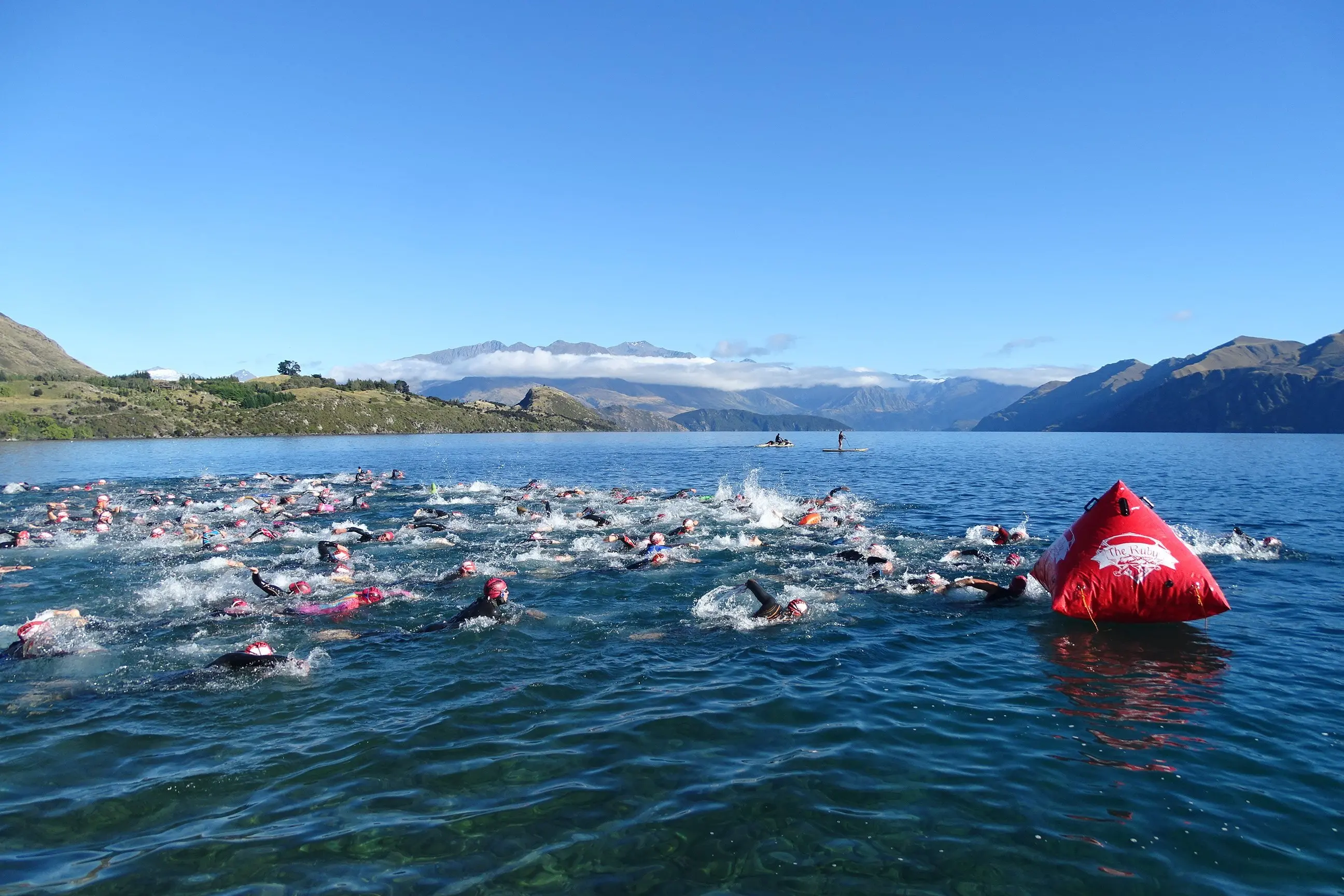 Swimmers compete in the The Ruby Swim race in Lake Wanaka in 2021. Photo: ODT Files