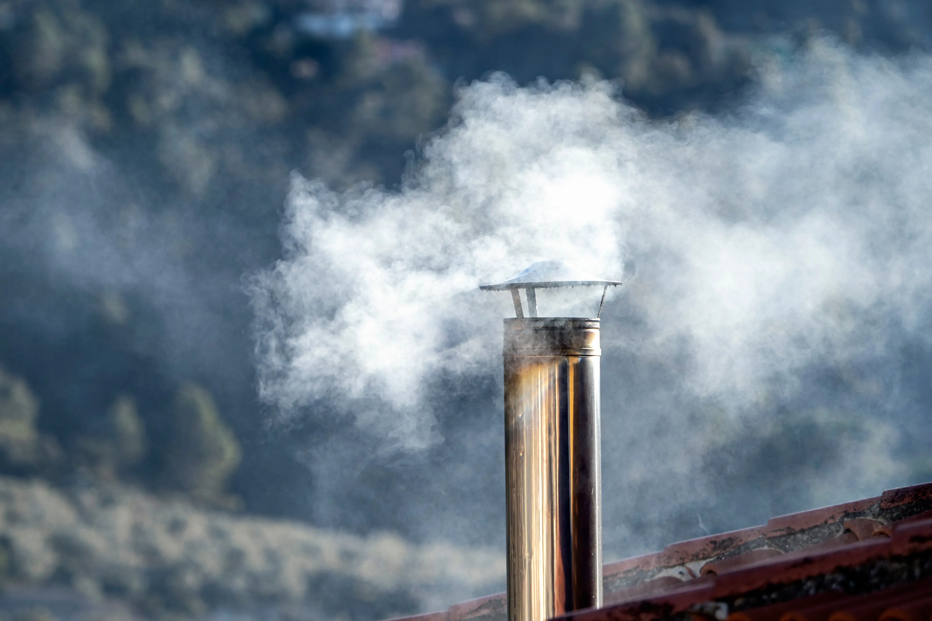 Smoking chimney . . . Residents are being reminded not to burn treated timber or other materials which could cause contaminants in the air. Photo: File