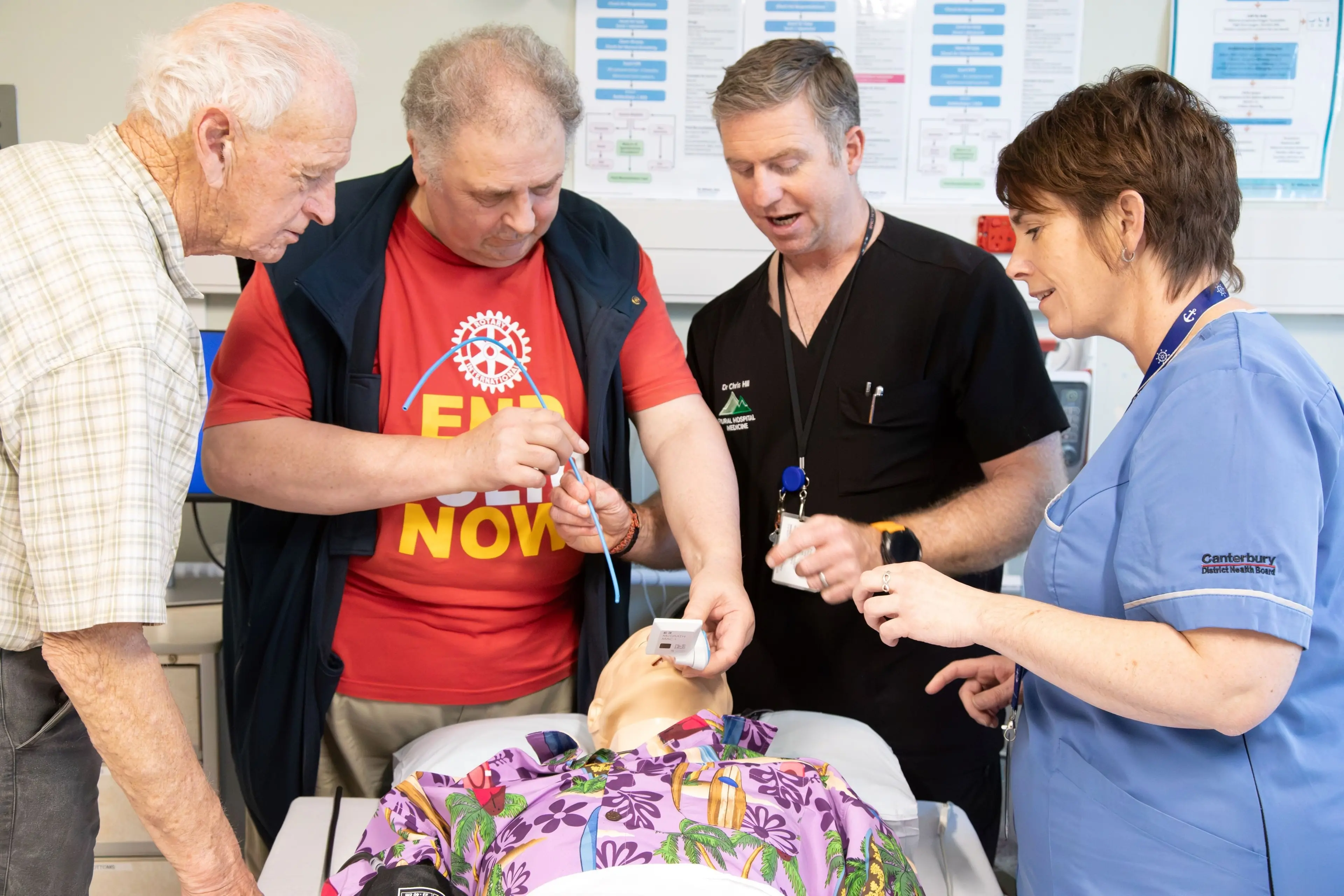 Plains Rotary of Ashburton Club members, from left, Wim Melchers and president Steve Allen - with clinical lead Dr Chris Hill and clinical lecturer and nurse Karly Burrowes from Rural Health Academic Centre at Ashburton Hospital - learn about the digital video laryngoscope while training on a medical mannequin. Photo: Heather Mackenzie