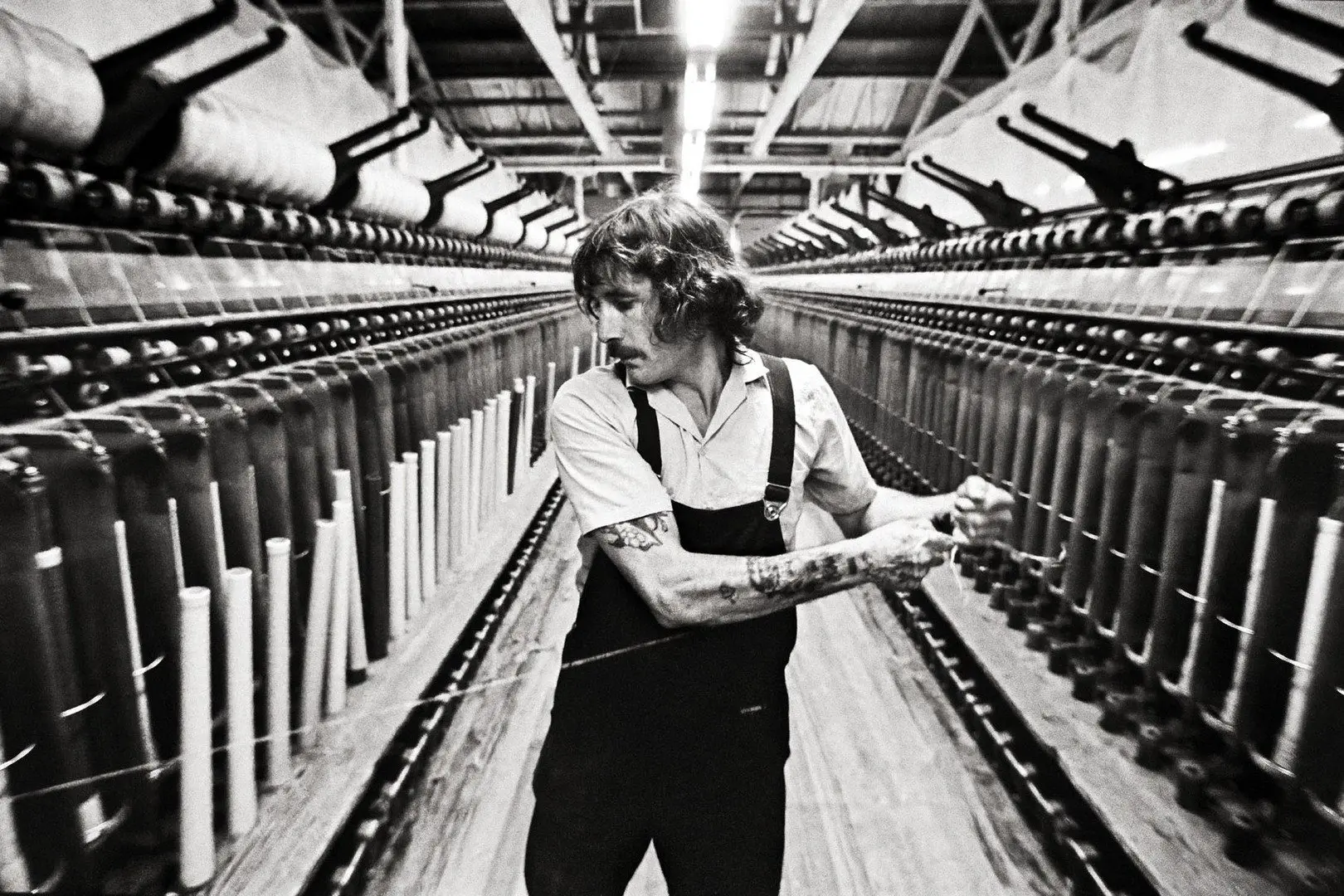 Anthony McKee\\u2019s photograph, Summit Woolspinners featuring worker Ivan Emerson (1993) is part of the Mahi, Toi exhibition which opens tomorrow at Forrester Gallery and Mahiki Kai Mahika Toi.