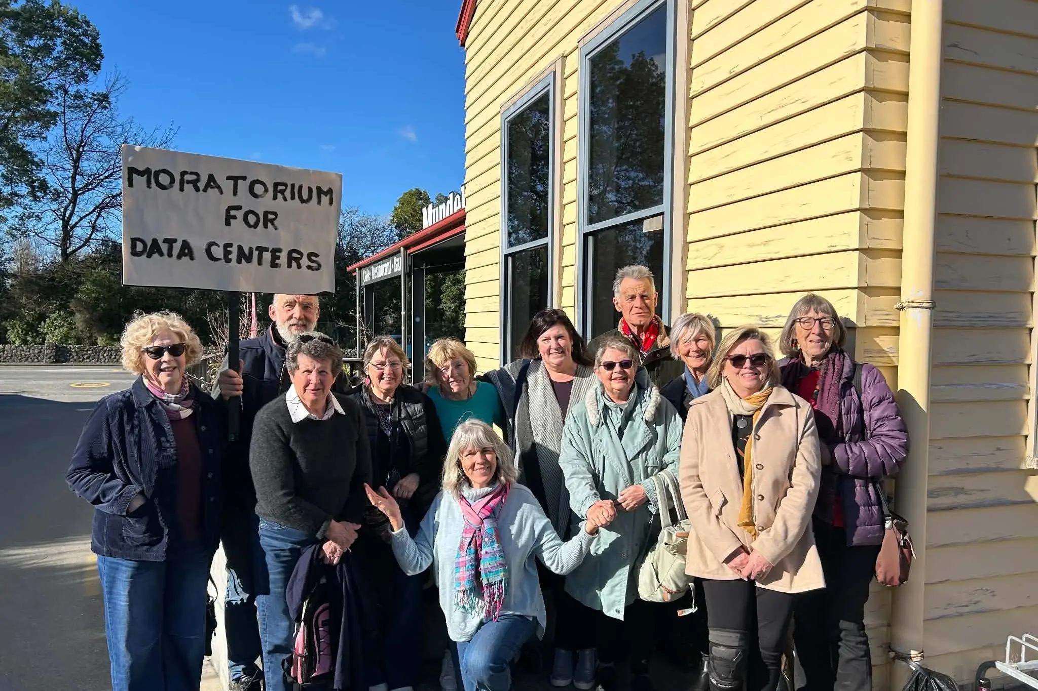 Traveling to Ashburton to seek clarity about a mega data centre proposed to be built in Geraldine are (back row, from left) Mary Powell, Horst Elsen, Jim Powell, (middle row) Jan Oliver, Margaretha Cambridge, Angela Gregg, Kristine Diehl-Breading, Gerrie Ligtenberg, Marg Bradley, Suzanne Barrett, Alison Longson, and (front row) Kate Elsen. Photo: Supplied
