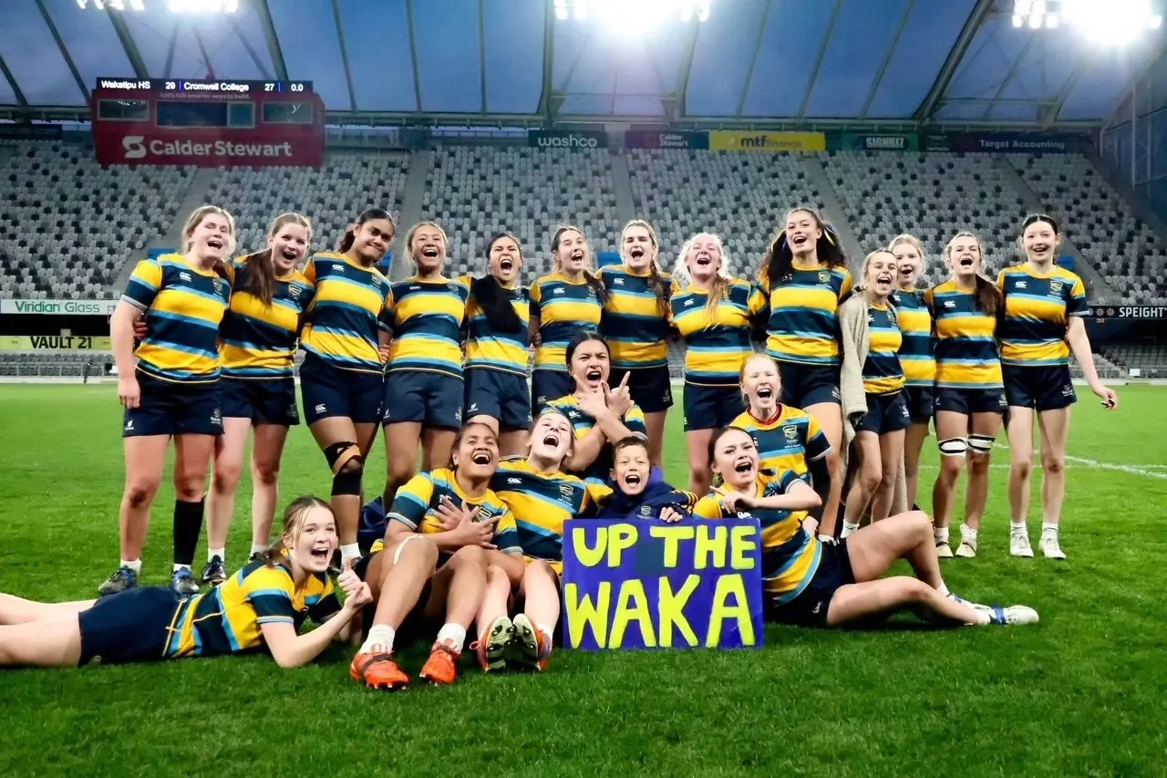 Up the Waka!: Wakatipu High School\\u2019s\\u00A0Girls\\u2019 1st XV celebrate after winning the Otago Country comp at Dunedin\\'s Forsyth Barr Stadium recently. Photo: De Rangi