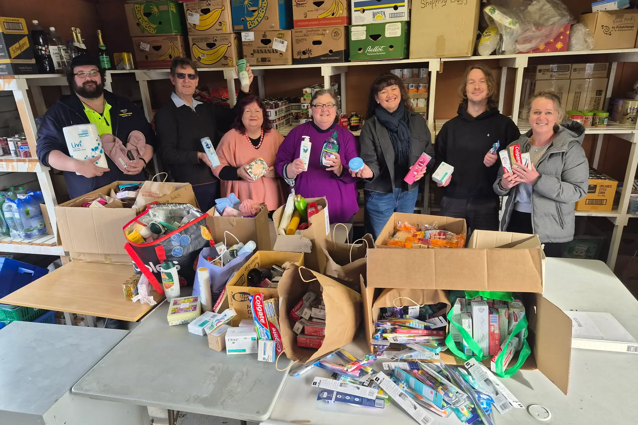 Celebrating a successful food bank drive are (from left) \\'Come from Away cast members\\' Karel Hill and Mark Lowen, South Canterbury Drama League musical section chairperson Nikki Carnegie, drama league members Jill de Joux and Sharleyne Diamond, Matt Dawson (Family Works Food Bank) and Family Works operations manager Lisa Dobson. Photo: Supplied