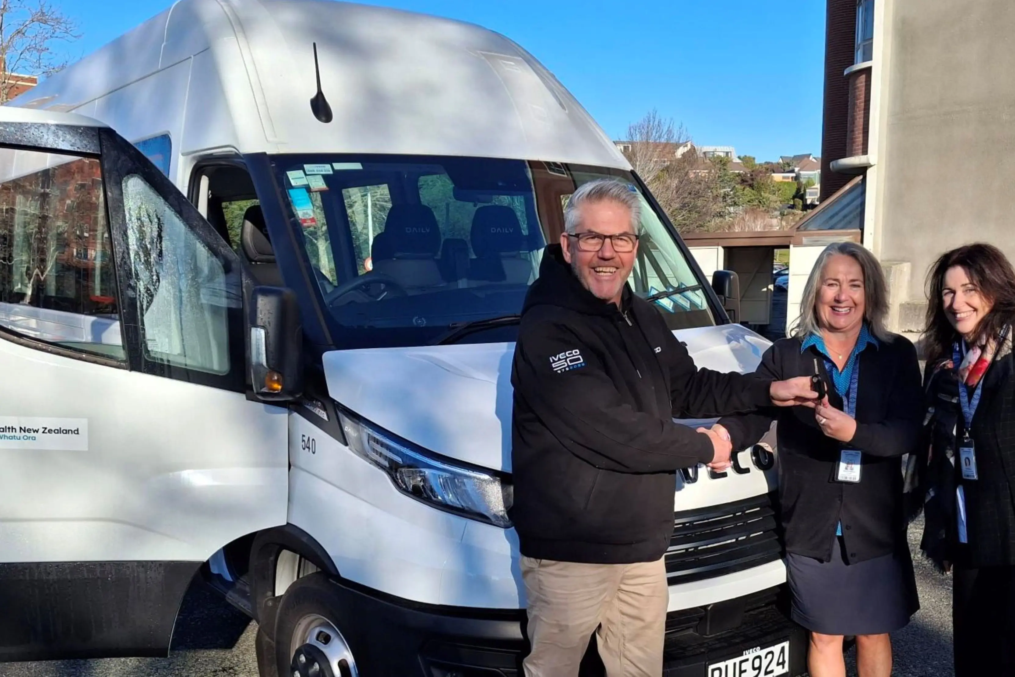 IVECO key account manager Craig Scher, from left, hands over the keys of the new community bus to Elizabeth Street Day Centre manager Sharron Wilson, and Ashburton and Rural Health Services general manager Berni Marra. Photo: Supplied