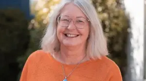 ‘On my second day, we were under the table, and it has never stopped since’: Community stalwart retiring