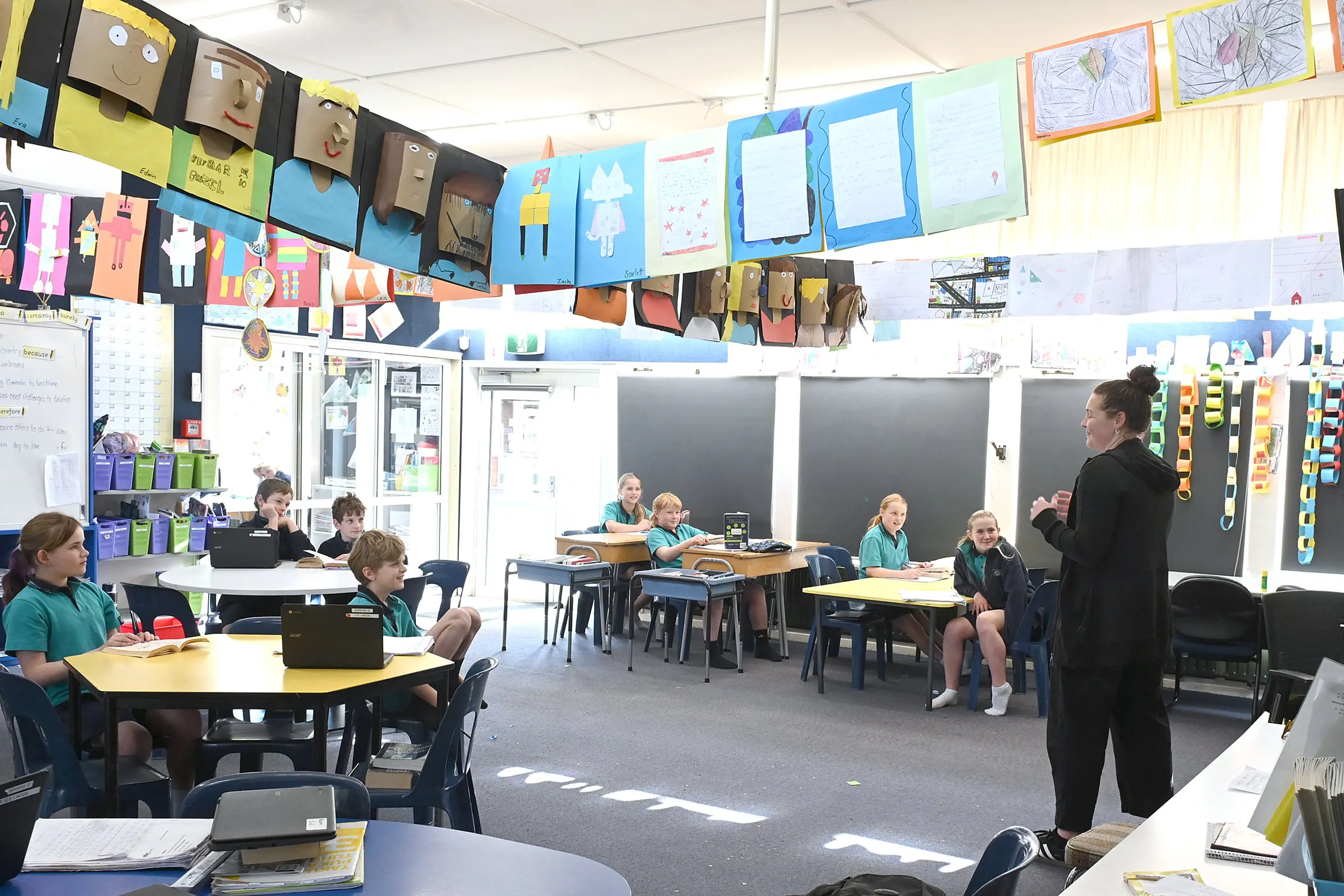East Taieri School teacher Rachel Phillips with the only eight children out of her Room 1 class of 29 who have not been off school because of illness in the last few weeks. Photo: Linda Robertson
