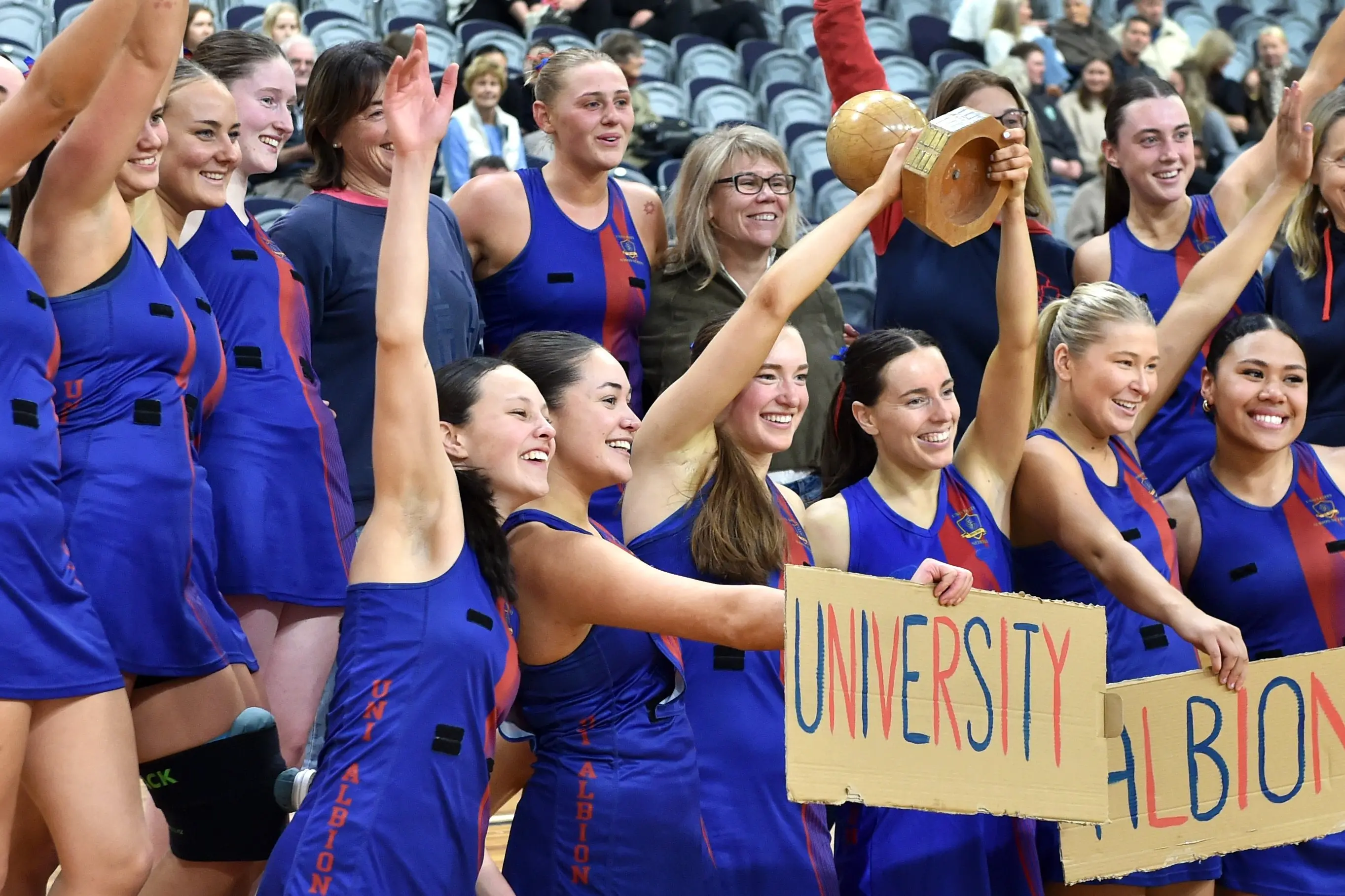 University Albion A celebrate winning their fourth straight Dunedin premier A title at the Edgar Centre in Dunedin on Saturday.\\u00A0Photo: Peter McIntosh