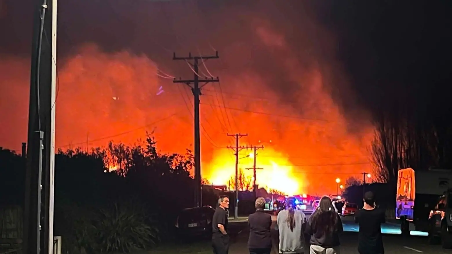 Houses evacuated as firefighters battle large Albert Town fire