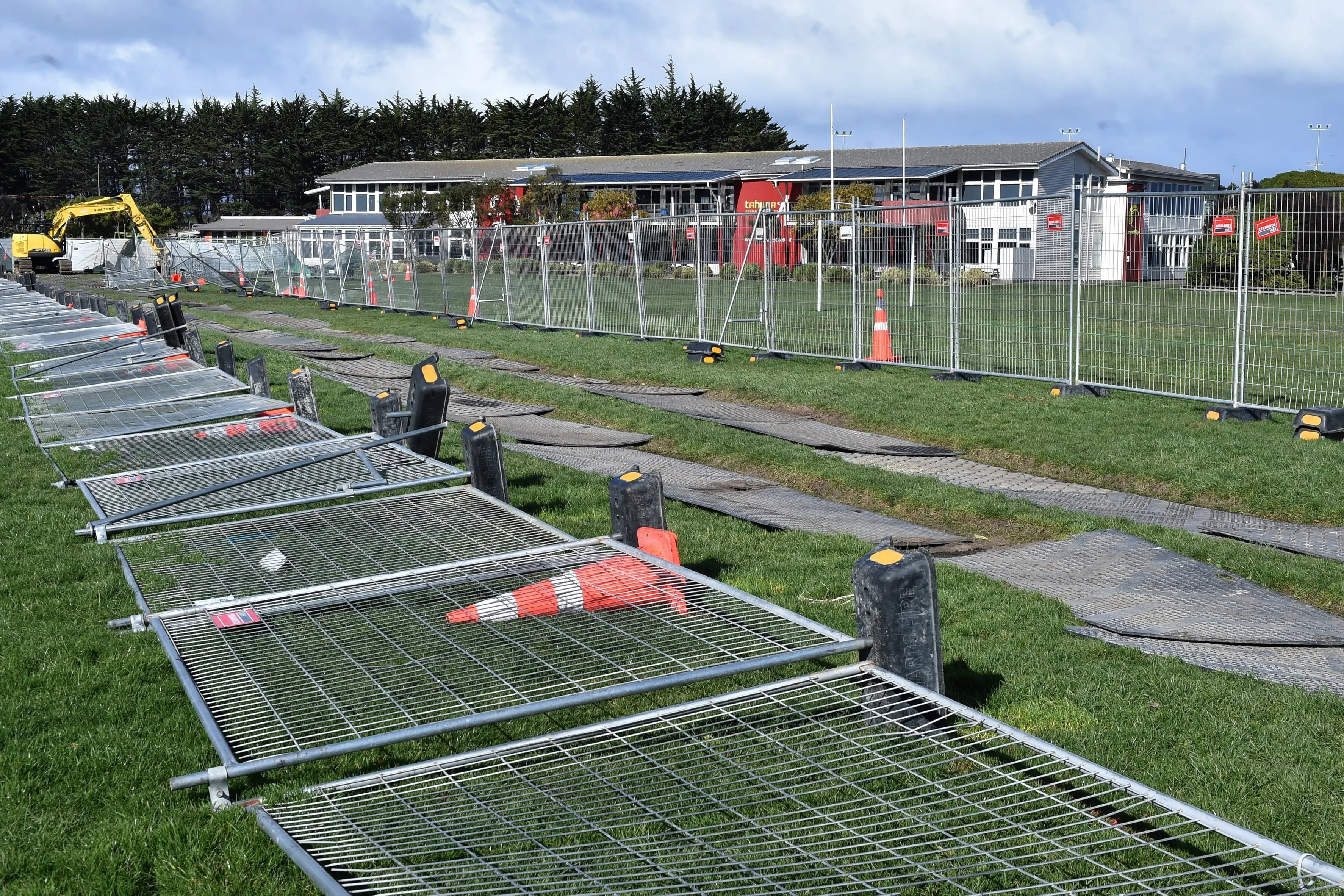 Safety fences were blown over after heavy winds at Tahuna Intermediate School in Dunedin on Sunday. Photo: Peter McIntosh
